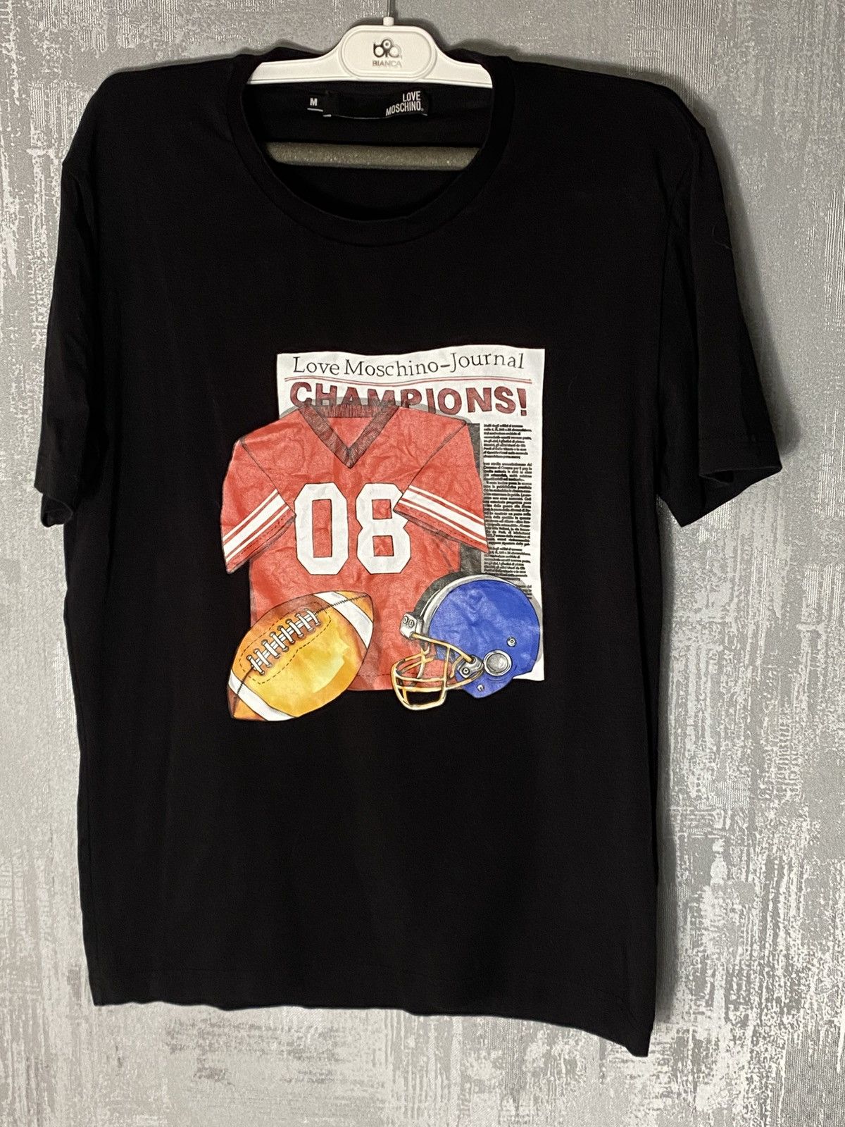 Japanese Brand × Moschino Love Moschino T-shirt NFL Champions Journal Designed Size US M / EU 48-50 / 2 - 1 Thumbnail