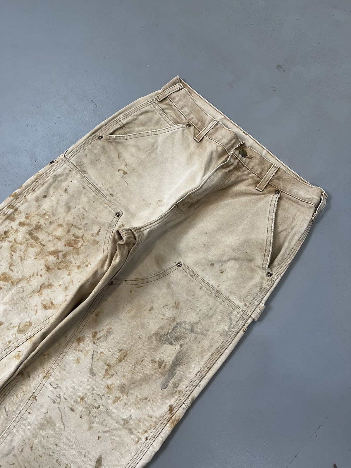 image of Carhartt x Vintage Sun Faded And Paint Splatter Car Hay Double Knee Denim in Beige, Men's (Size 30)