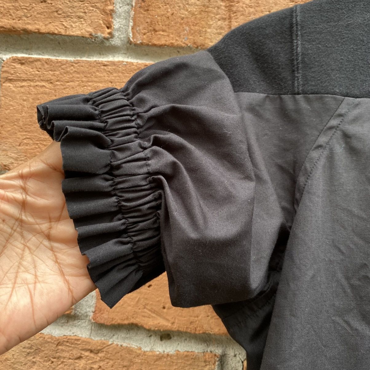Sacai X Nike Black Short Sleeve Nike Top with Ruffle Trim