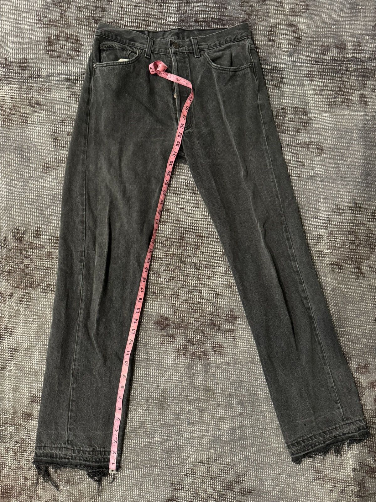 Vintage Levi black denim with distressed hem