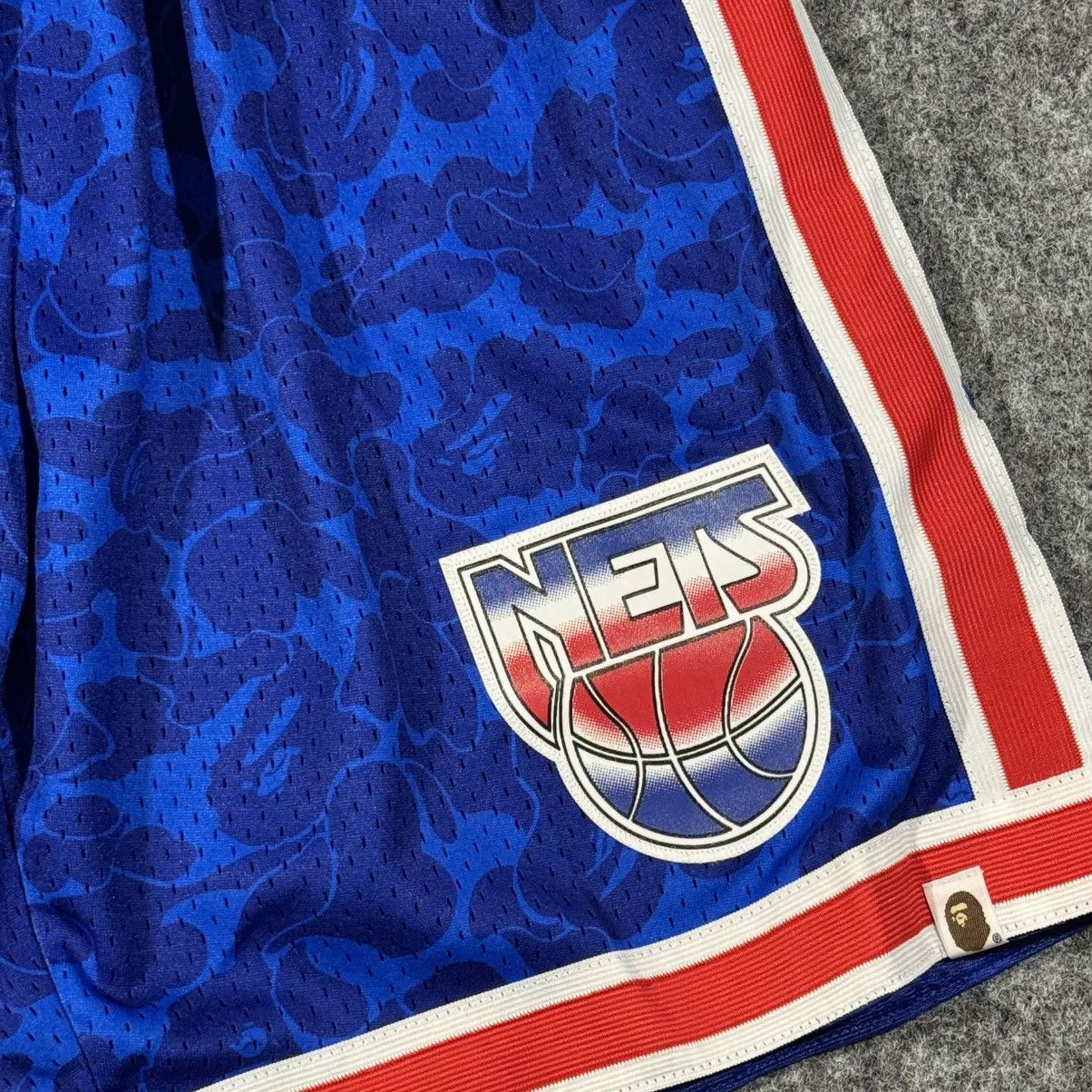 Bape × Mitchell & Ness BAPE x Mitchell & Ness New Jersey Nets Shorts Blue Size US 33 - 3 Thumbnail