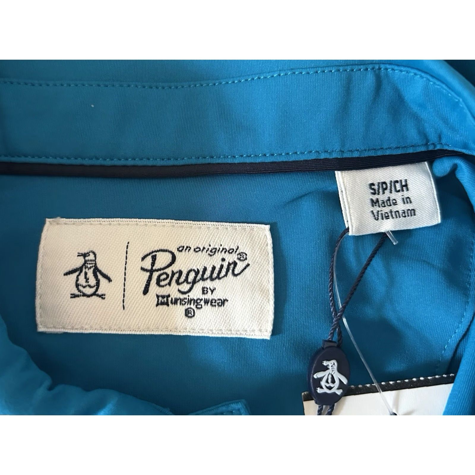 Original Penguin VINTAGE Original Penguin by Munsingwear Golf Polo Mens XS NOS NWT Ocean Blue Short Sleeve Collared Patch Logo 27.5" Long 20" Across 9.5" Sleeves Mens Size US S / EU 44-46 / 1 - 6 Thumbnail