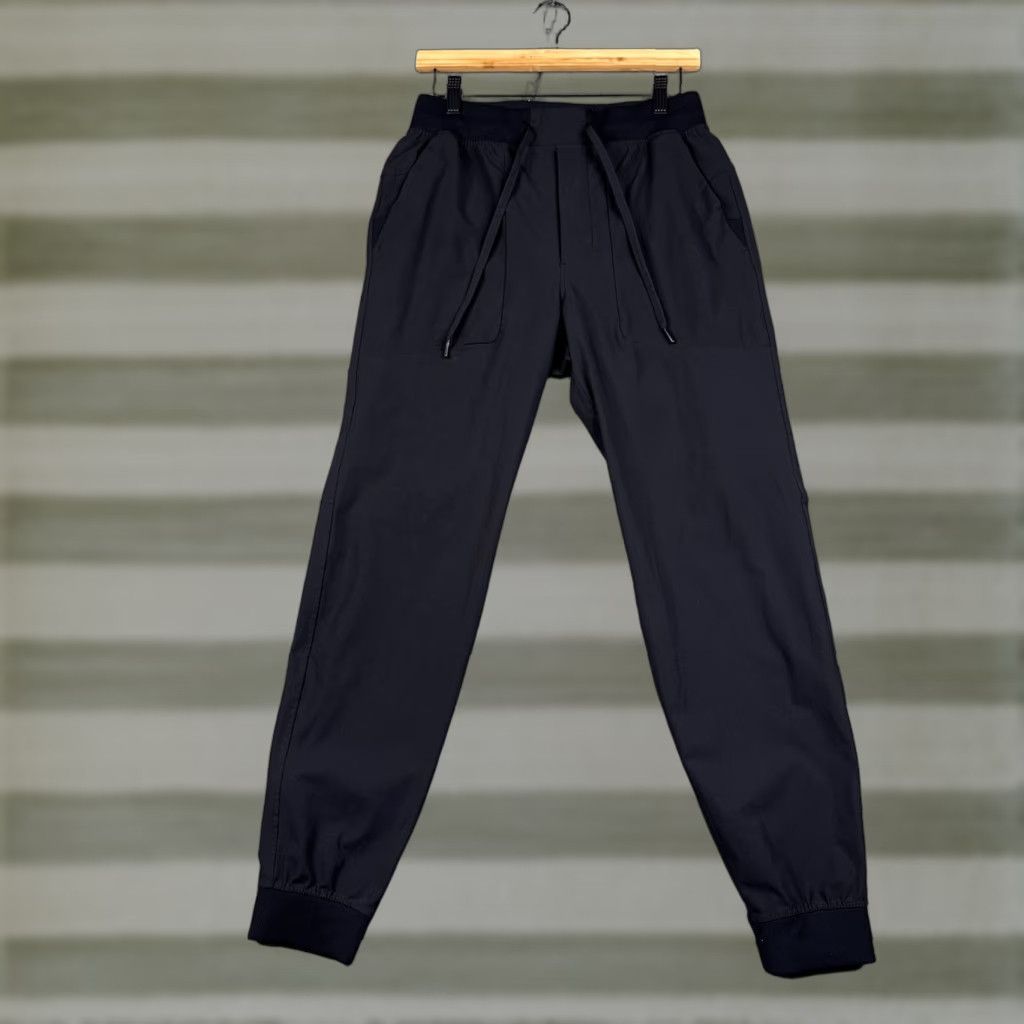 Lululemon ABC Jogger Pants Mens M Black Tapered Warpstreme Casual Athletic Logo Modern