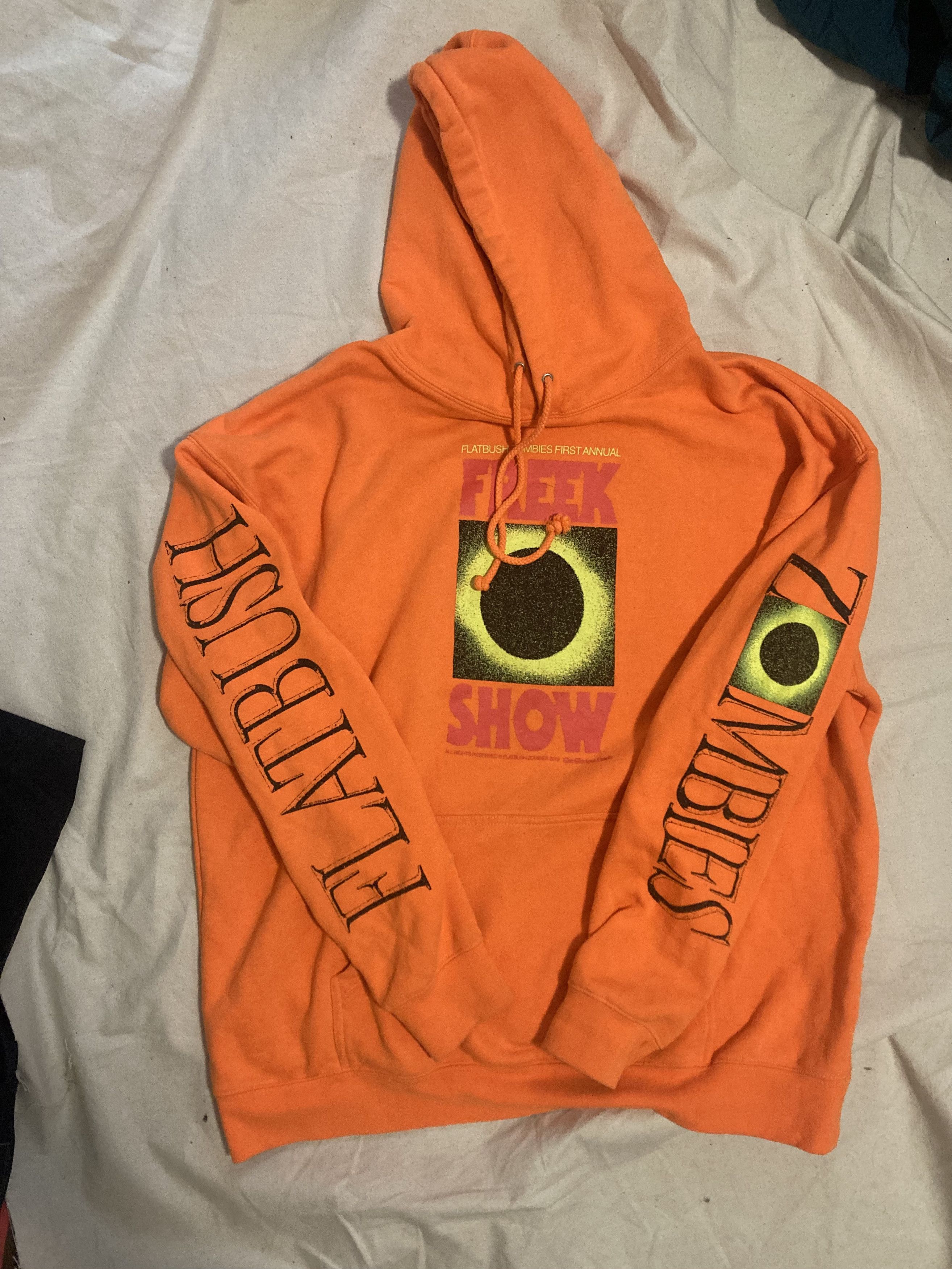 Image of Flatbush Zombies 2019 Freek Show Merch Hoodie in Orange, Men's (Size XL)