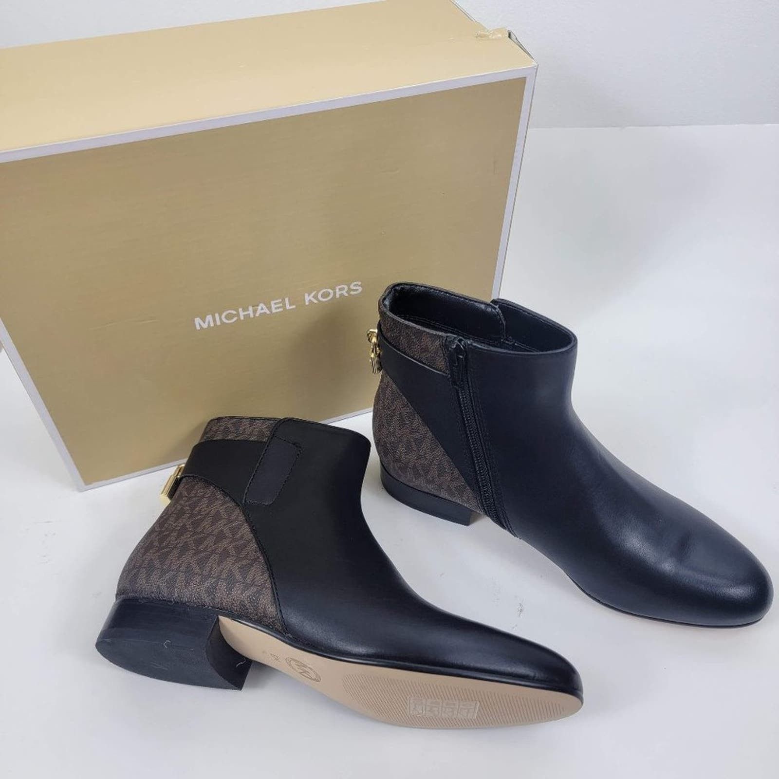 image of Nwb Michael Kors Mira Flat Bootie Leather Logo Brown Lock in Black, Women's (Size 6)