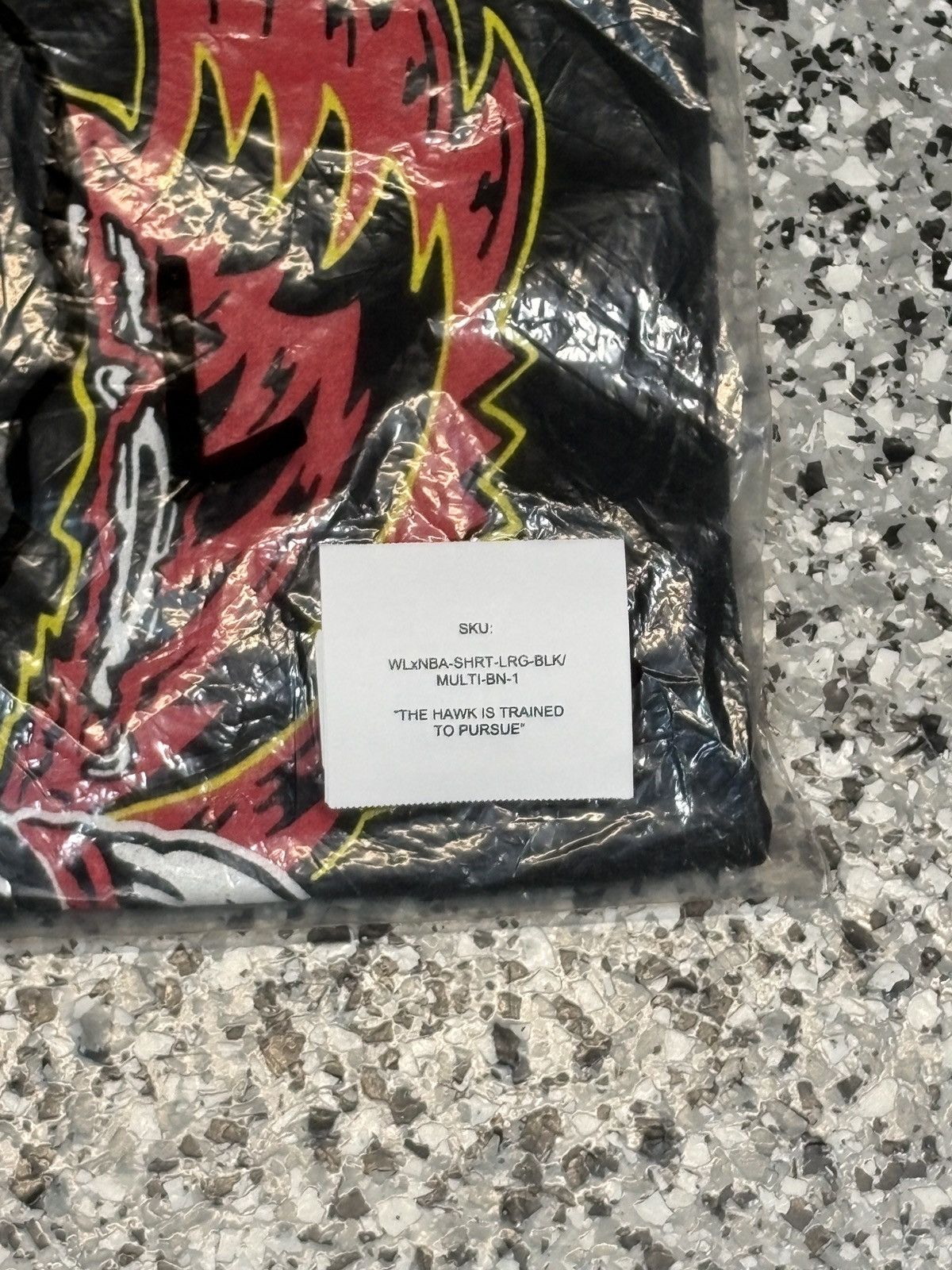 NBA × Warren Lotas Warren Lotas X NBA “The Hawk Is Trained To Pursue” Tee Sz. L Size US L / EU 52-54 / 3 - 8 Thumbnail