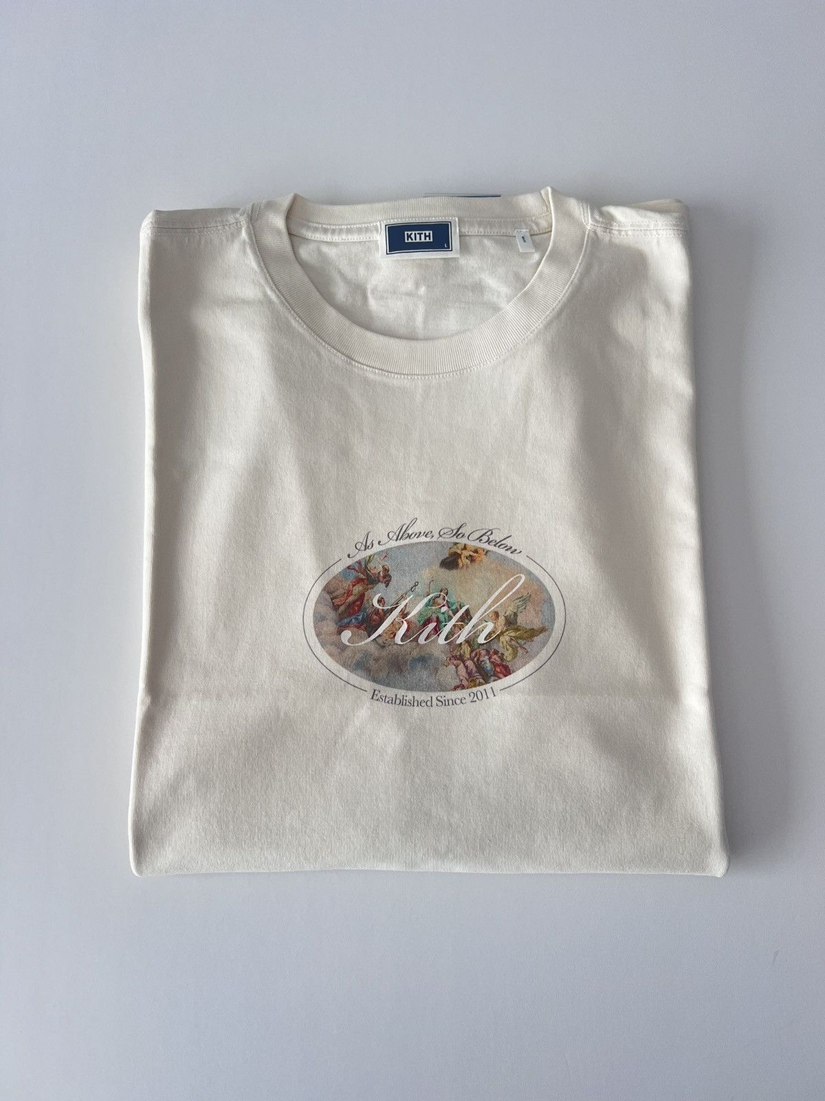 Kith Kith Angelic Script logo tee Sandrift | Grailed