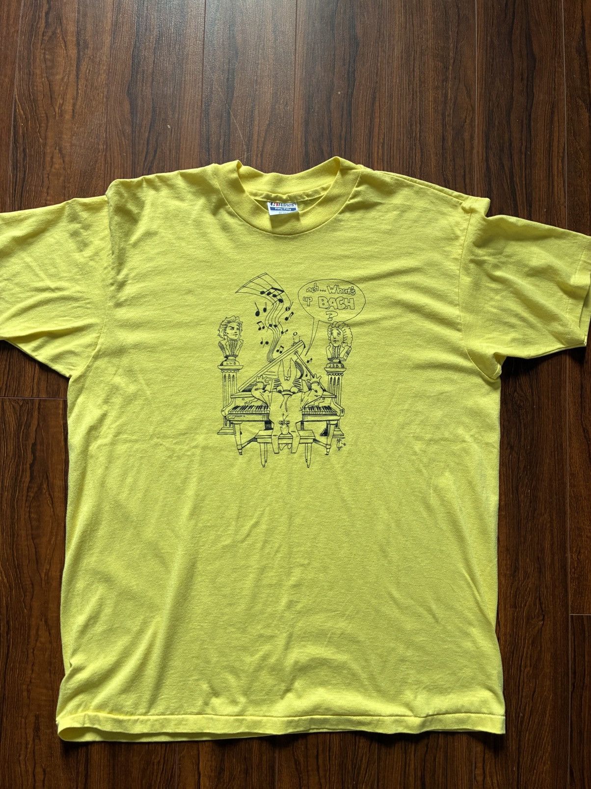 Vintage “Neh… What’s Up Bach” Graphic Yellow T-Shirt.Size XL