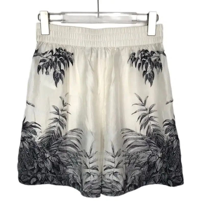 Burberry Women's Silk Beige Shorts.