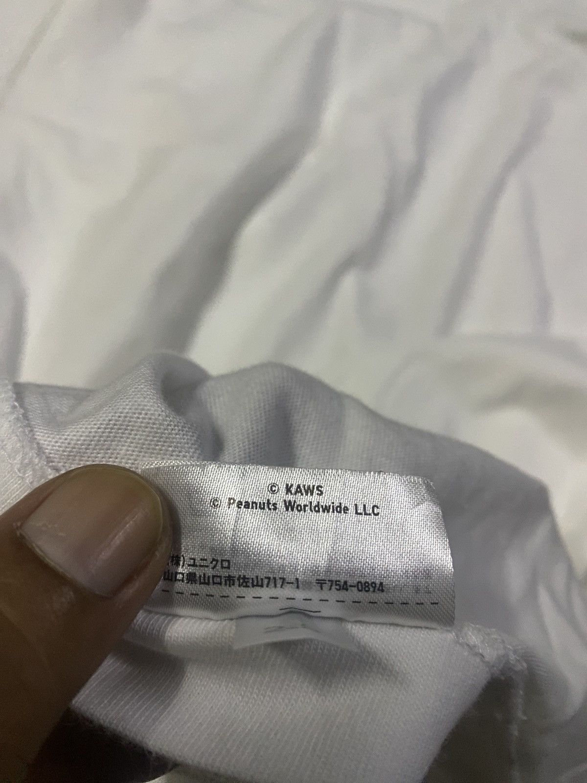 Japanese Brand × Kaws × Uniqlo FIRE 🔥 KAWS X UNIQLO SNOOPY DESIGN Size US XXL / EU 58 / 5 - 13 Thumbnail