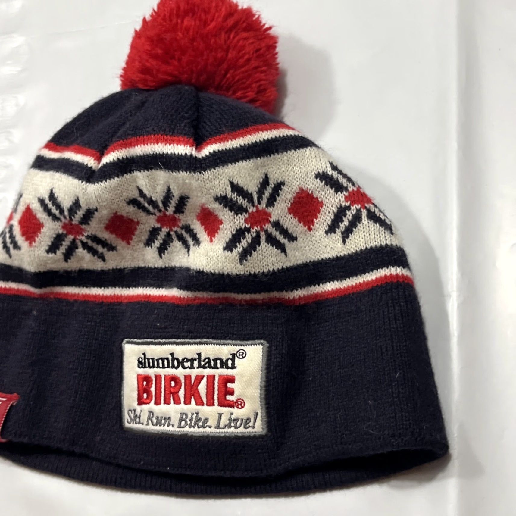 Vintage Slumberland Birkie 2021 Ski Run Bike Live Winter Red Pom Hat Snowflake Nordic Knit Beanie Mens One Size Black Winter Navy Blue Red Accent Size ONE SIZE - 5 Thumbnail