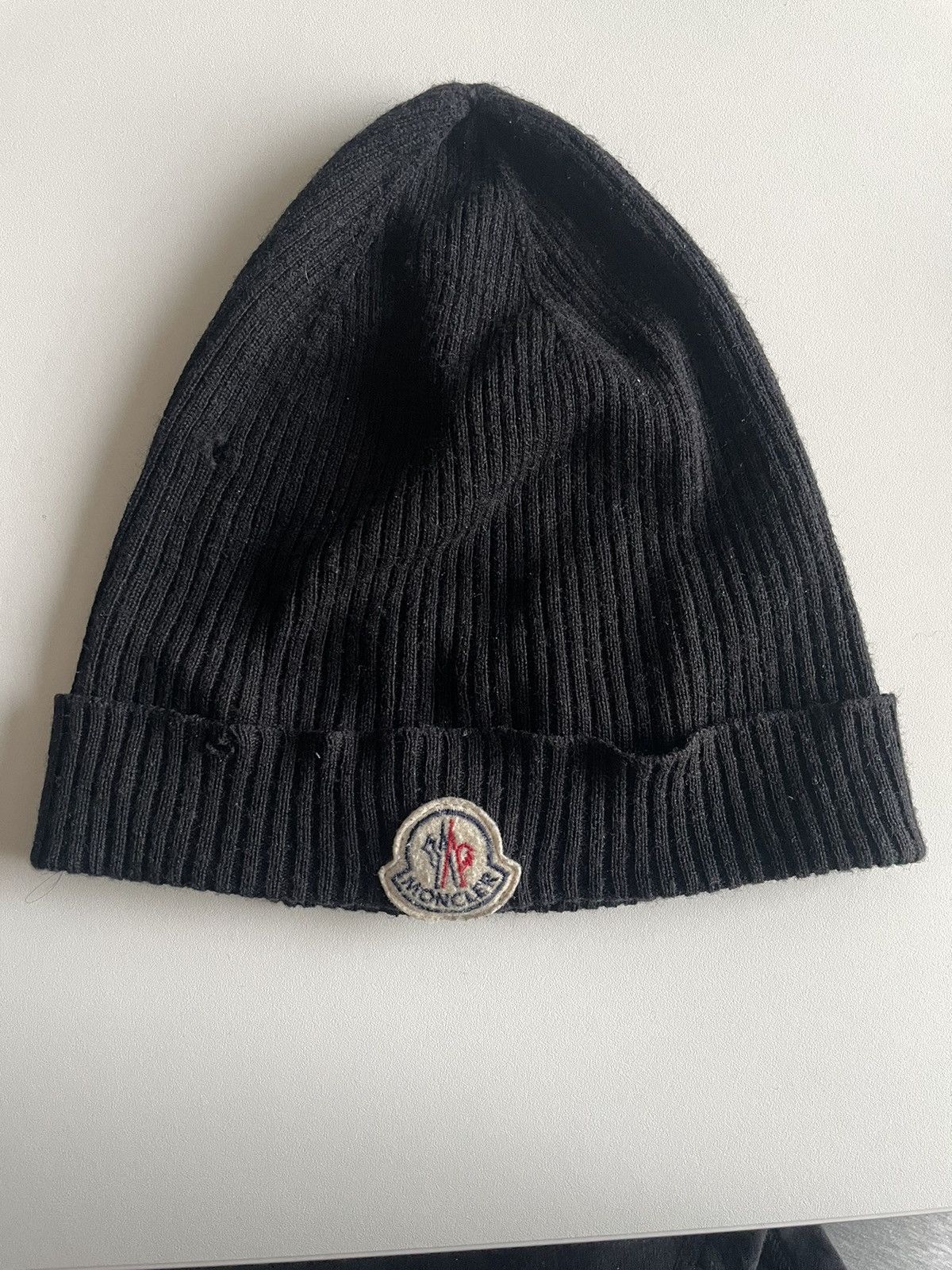 image of Moncler Ribbed Wool Beanie in Black, Men's