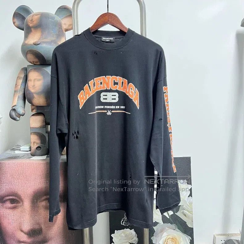 Balenciaga Distressed Long Sleeve Top.