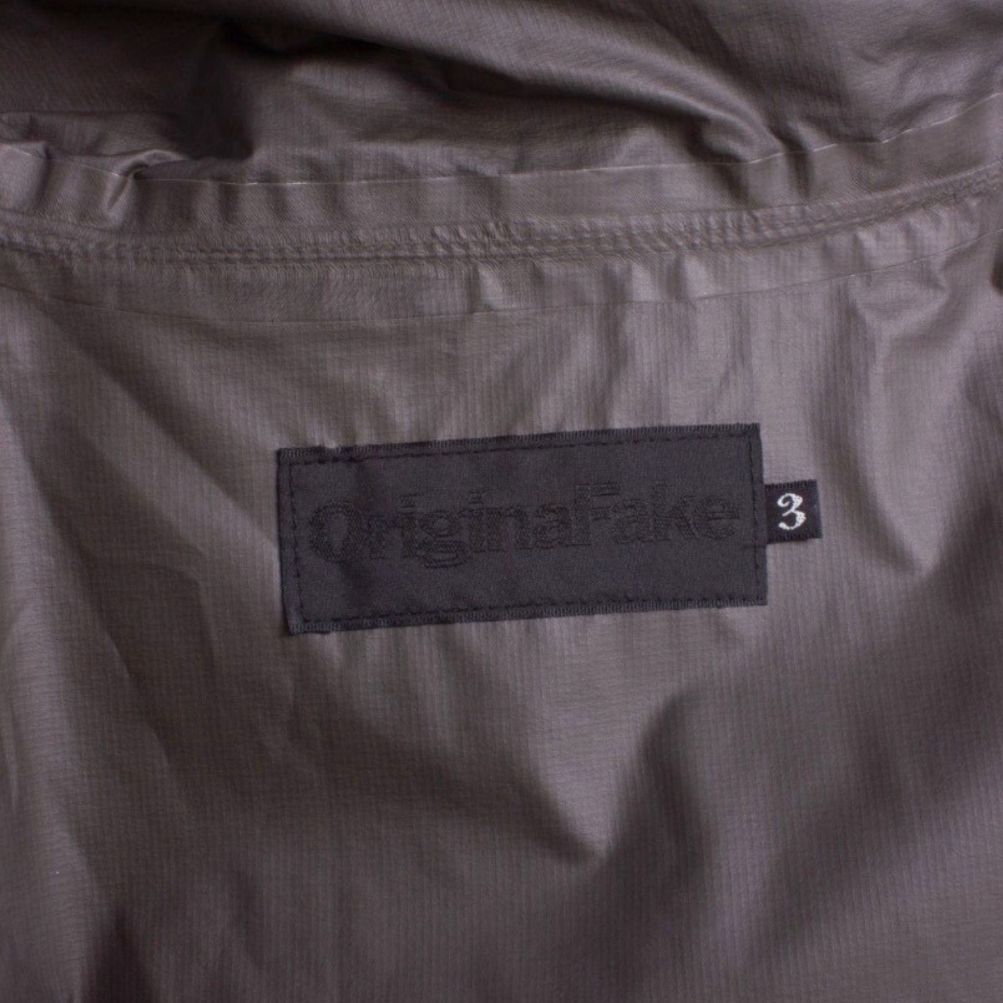 ORIGINALFAKE KAWS Archival Black Gore-Tex Hooded Jacket