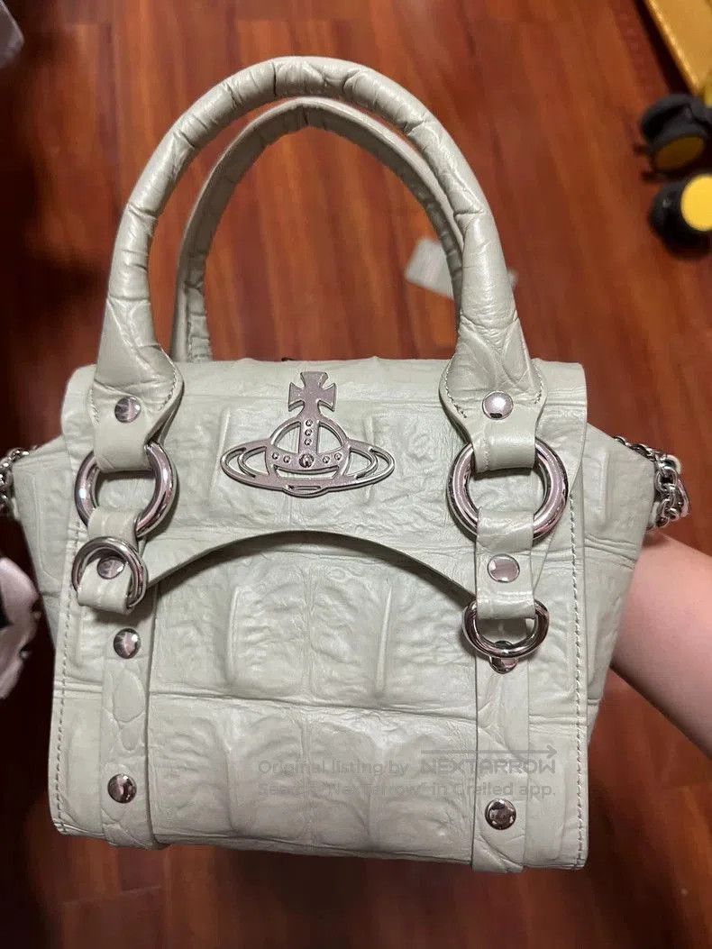 Vivienne Westwood Betty Dino pattern cowhide bag.