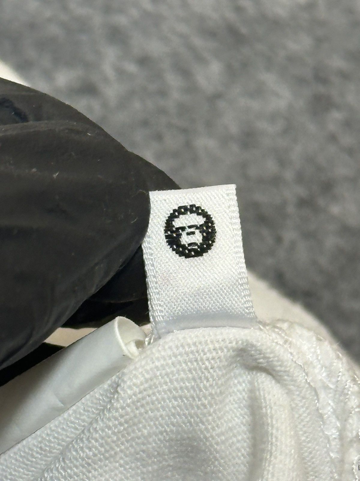 Aape AAPE by A Bathing Ape Moon Face Camo T-shirt in white. Size US M / EU 48-50 / 2 - 11 Thumbnail