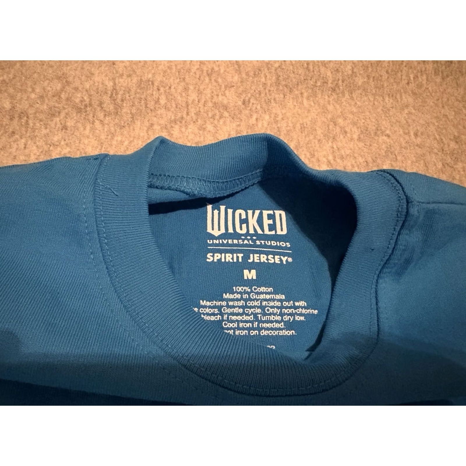 Vintage Wicked Universal Studios Spirit Jersey University Blue Medium NWT Women M Long Sleeve 100% Cotton Shiz University Shirt Brand New Size M / US 6-8 / IT 42-44 - 5 Thumbnail