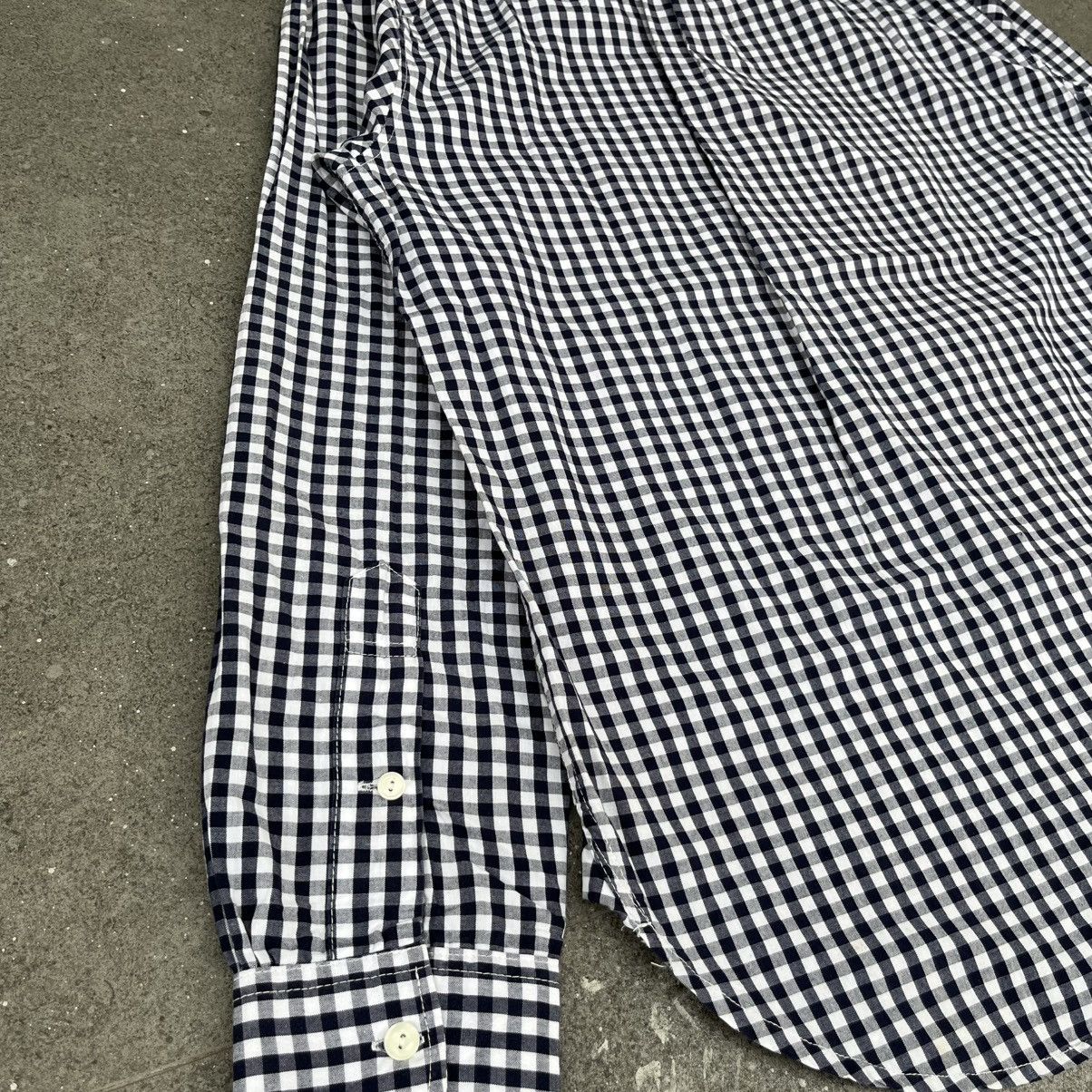 a blue garments plaid shirt button