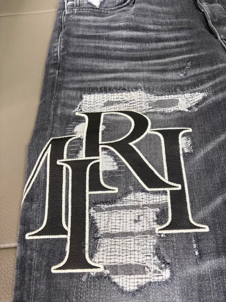 Amiri Amiri Size 32 Leather-paneled stretch jeans size 32 Size US 32 / EU 48 - 3 Thumbnail