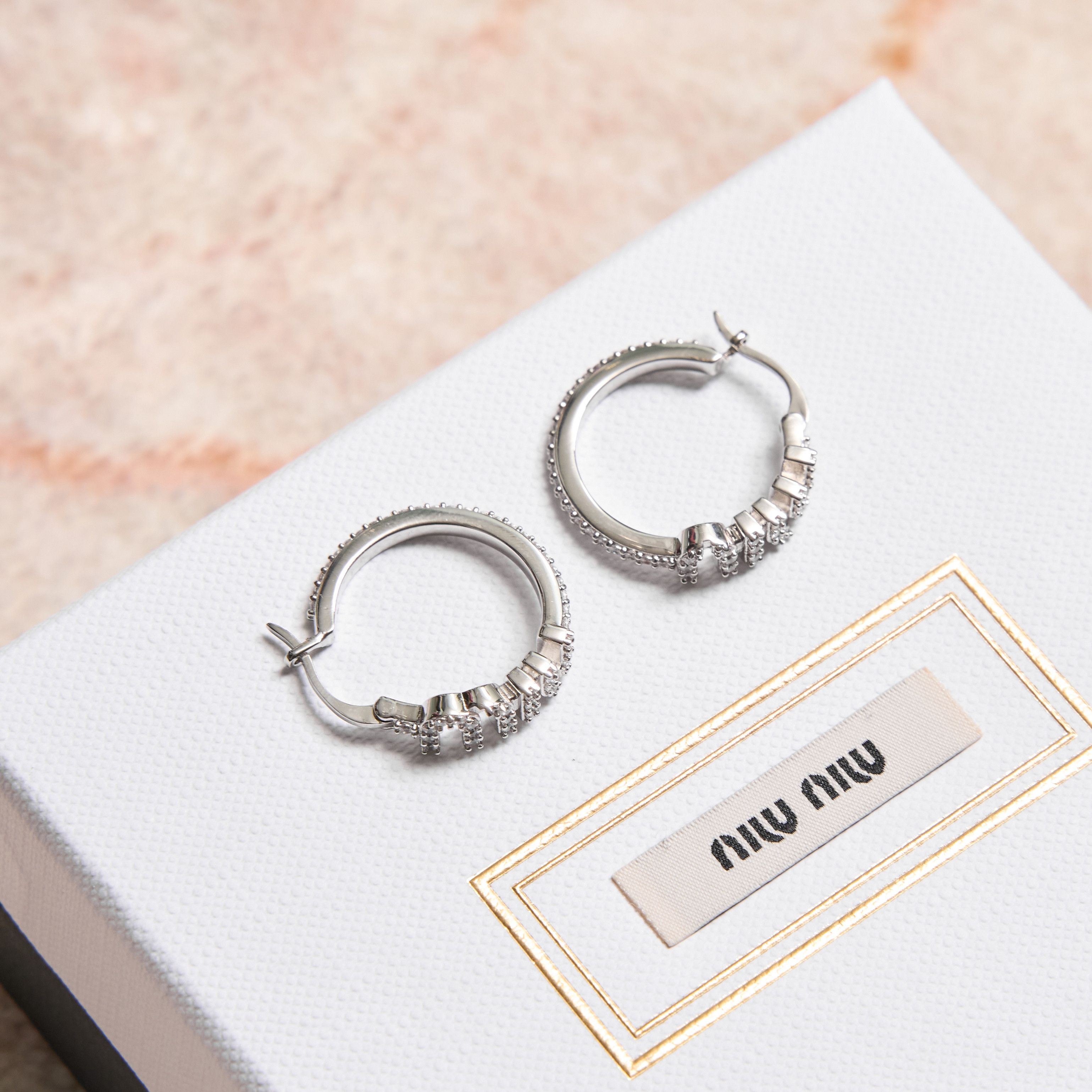 Miu Miu Miu Miu Earrings | Grailed