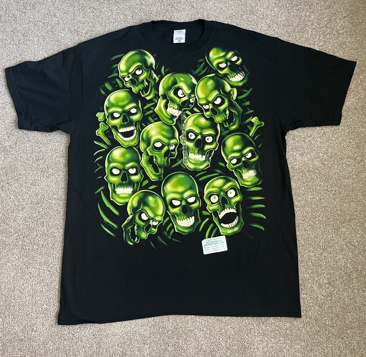 image of 2001 Liquid Blue Anvil Green Skulls Pile - Glow In The Dark in Black, Men's (Size XL)