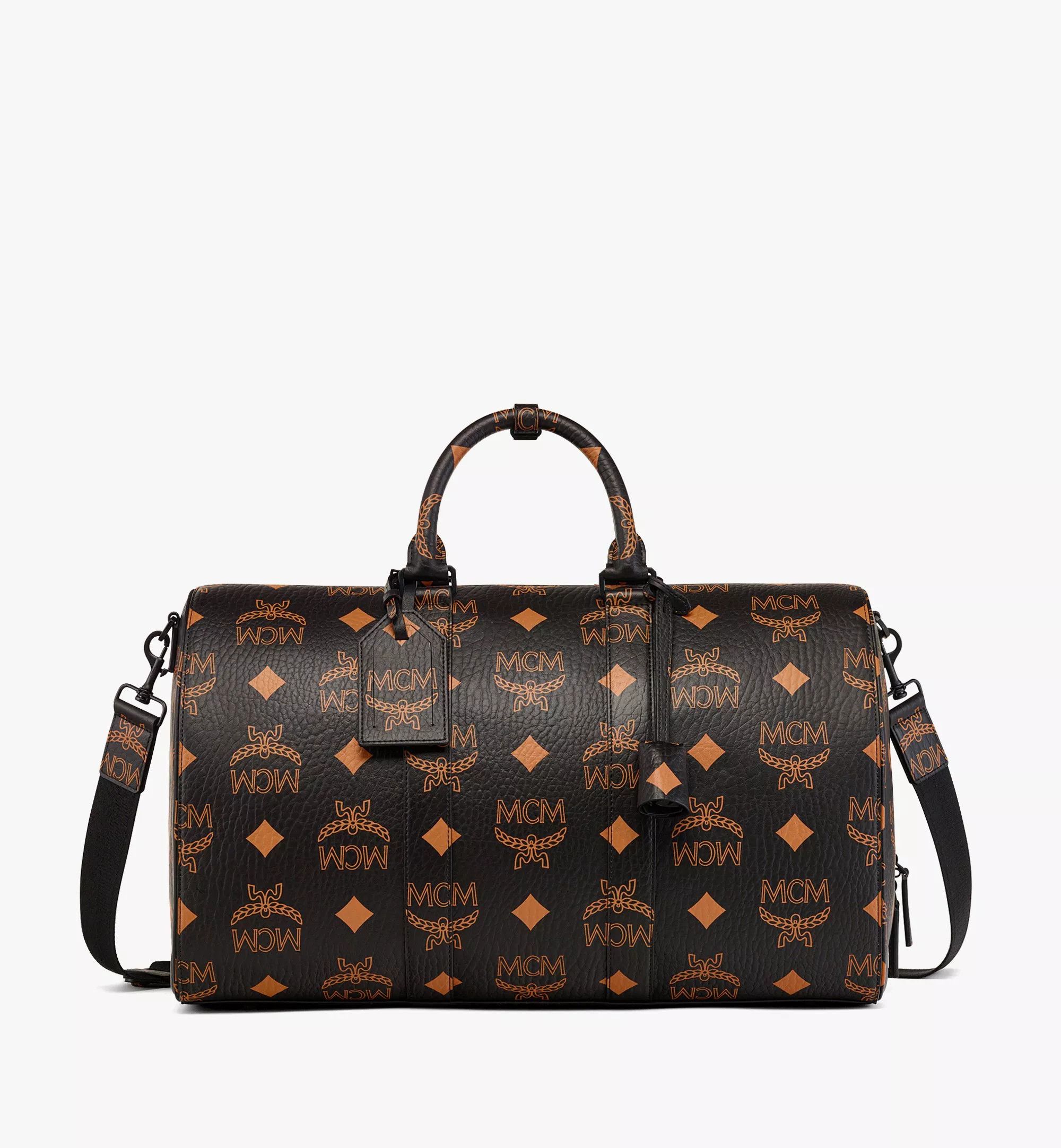 MCM o1mt1gz0125 Size: OS / Unisex Weekender Bag in Black/Orange Size ONE SIZE - 1 Thumbnail