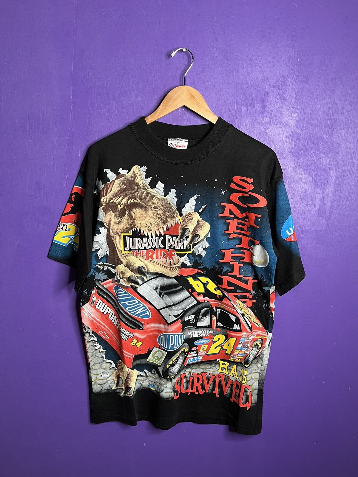 image of Made In USA x Nascar Vintage 90's Nascar Jurassic Park T-Rex Aop T-Shirt in Black (Size Medium)