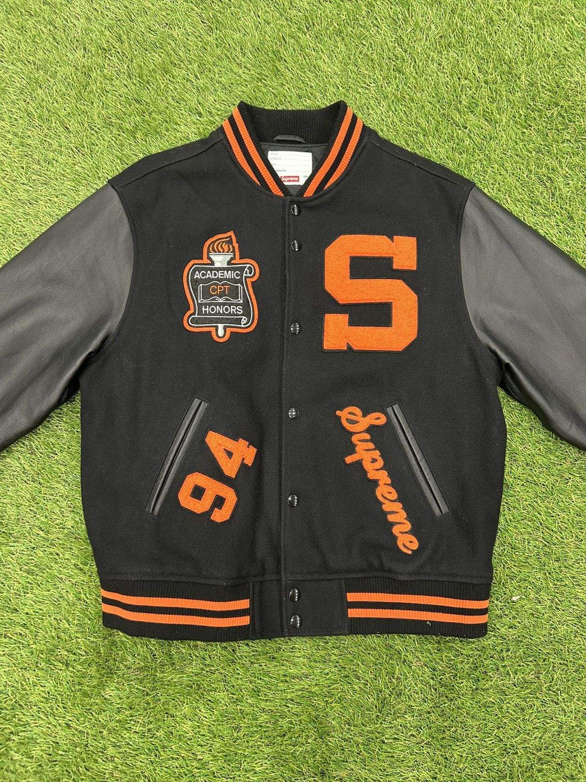 Supreme Supreme team varsity jacket black orange | Grailed