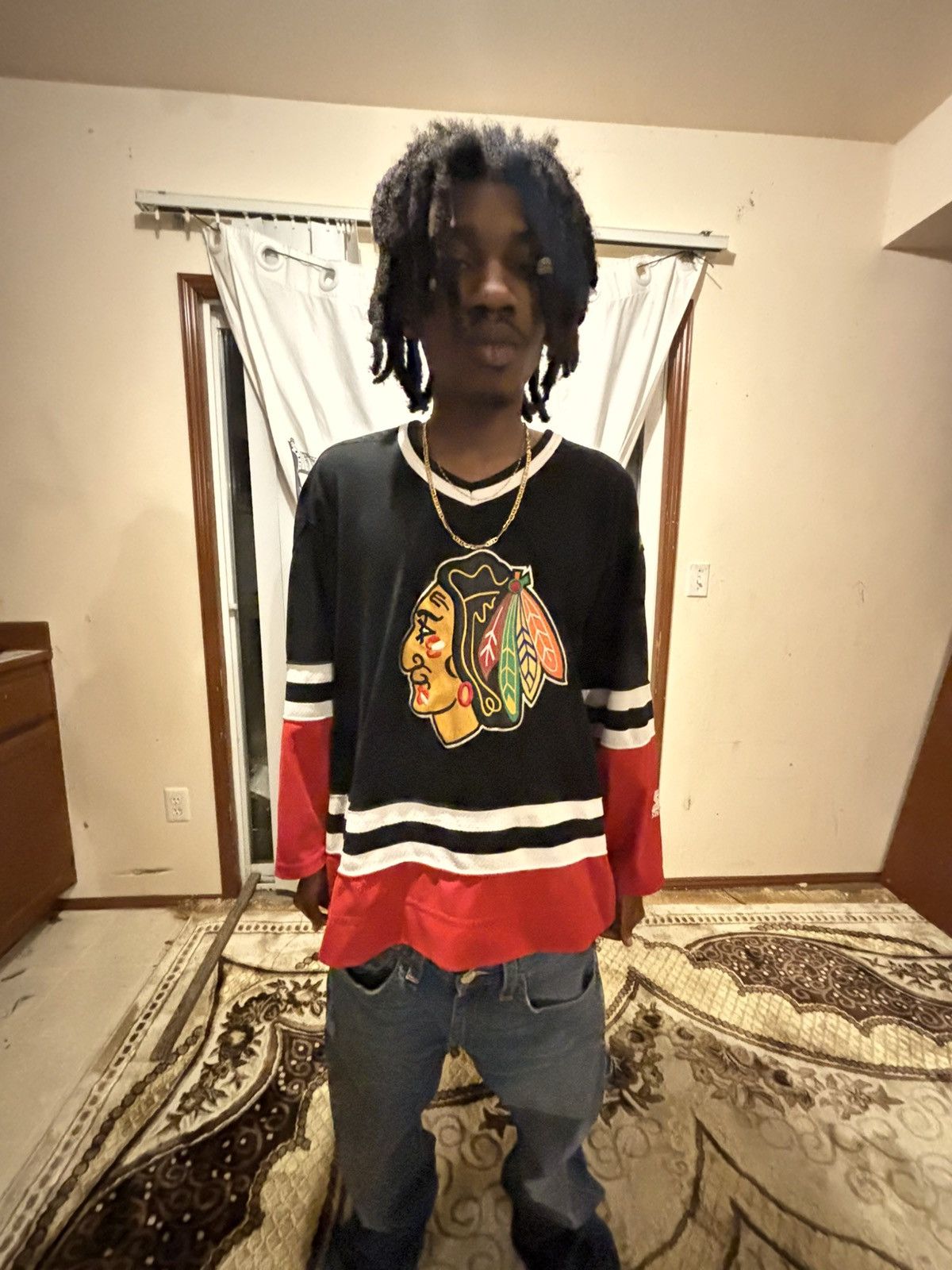Black and red Blackhawks jersey