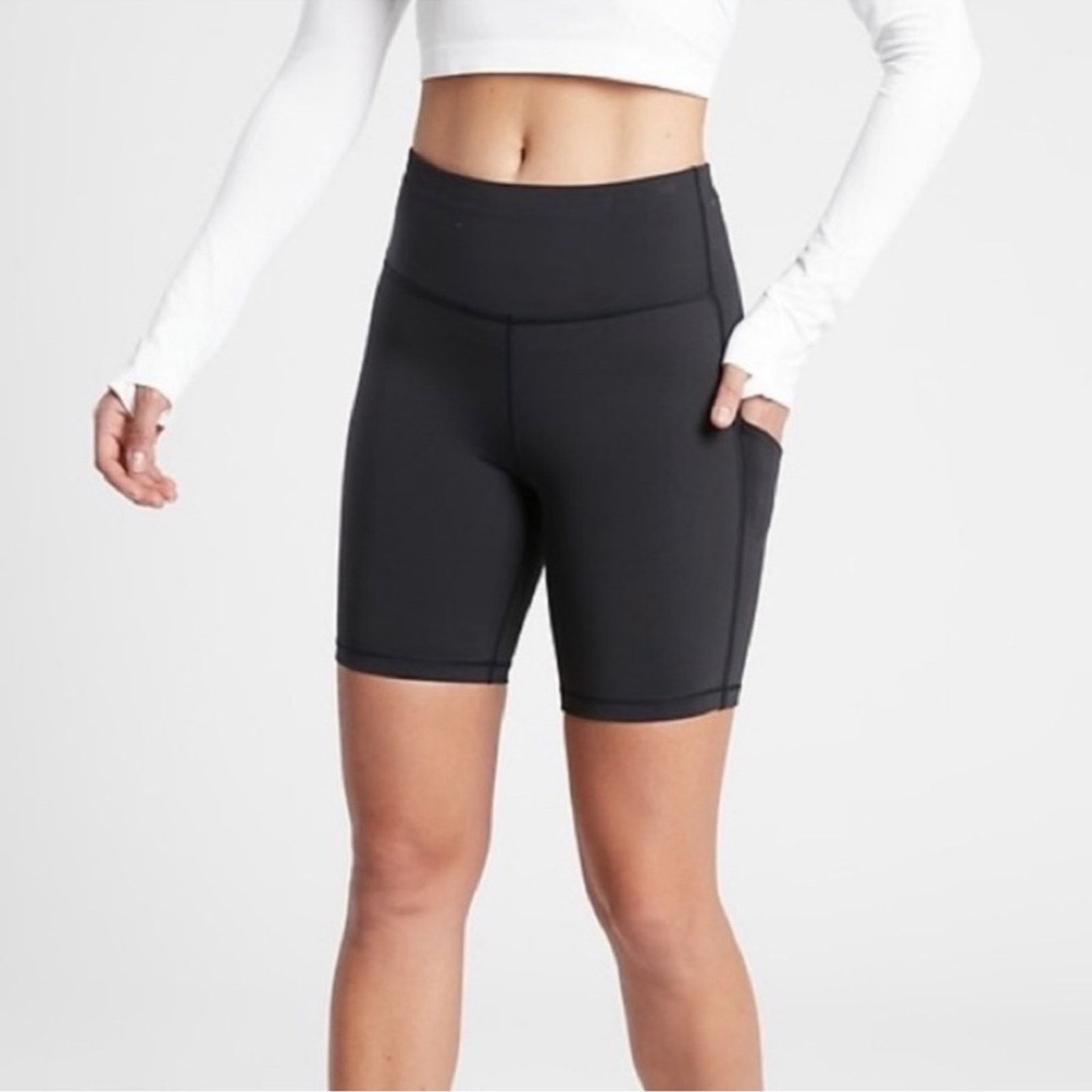 Athleta Athleta Ultimate Stash Pocket 7" Biker Shorts Black Size XS Size 27" / US 4 / IT 40 - 1 Thumbnail
