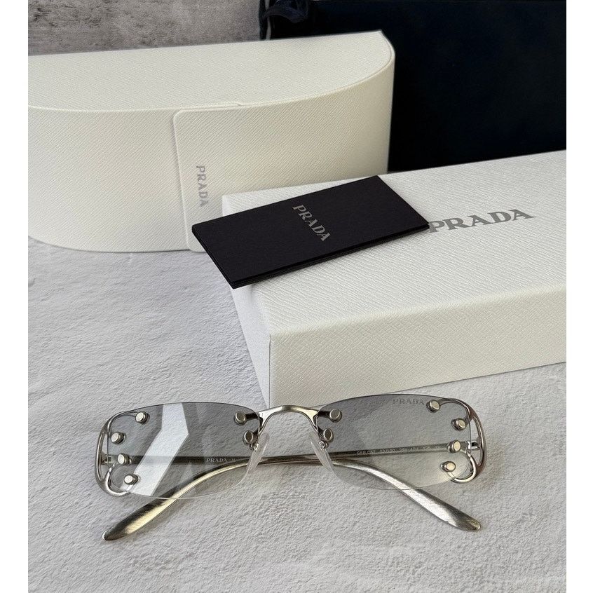 Prada NEW Prada PR C57S Sunglasses in Silver Grey $815 Size ONE SIZE - 1 Thumbnail