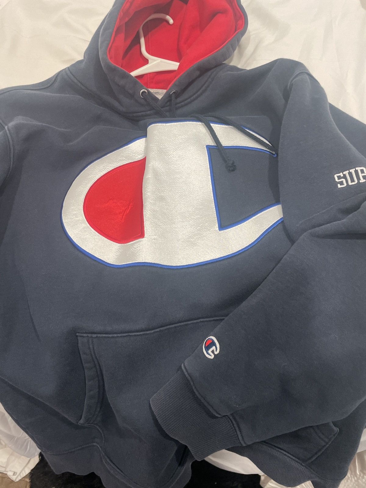 Supreme Supreme champion satin logo hoodie | Grailed