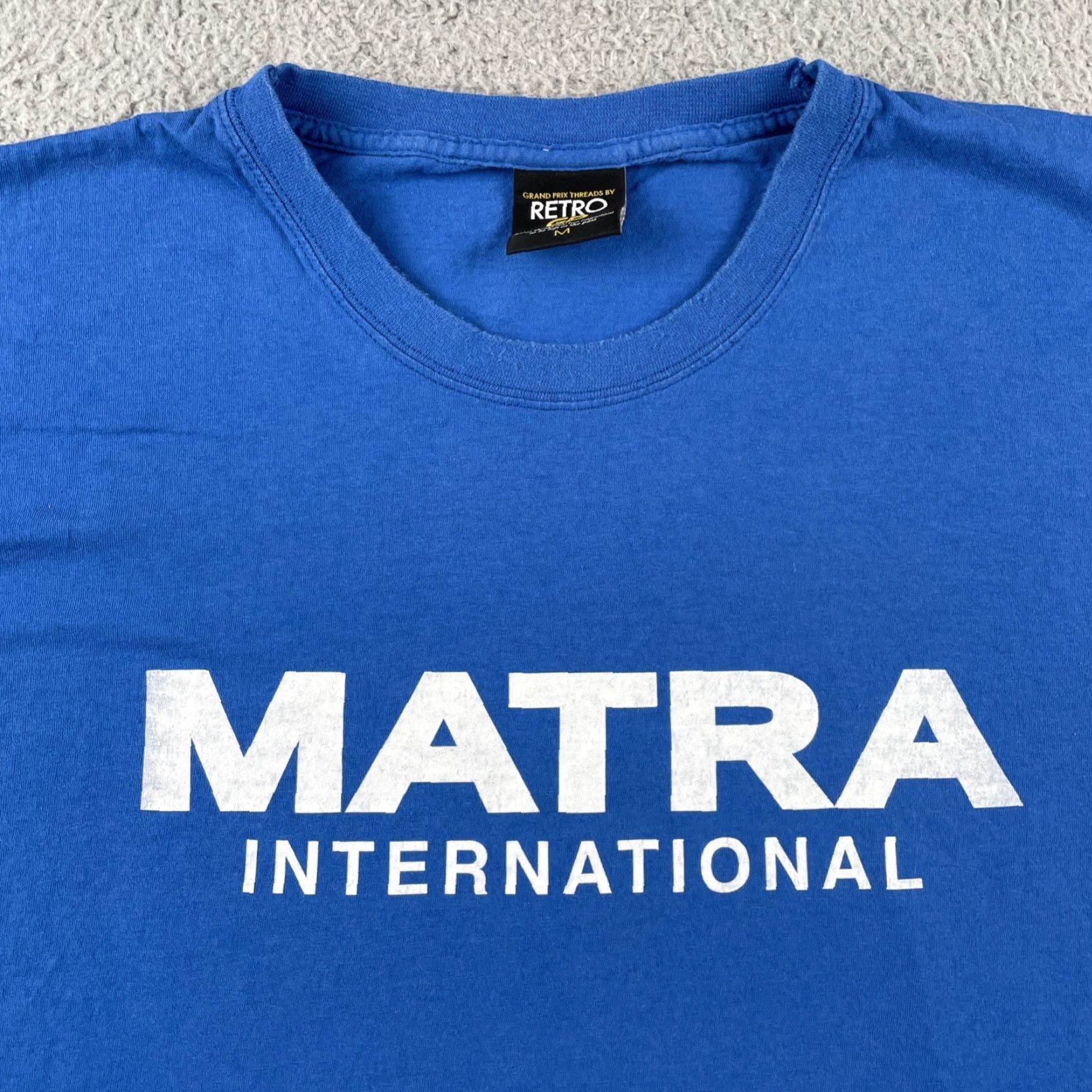 Champion VINTAGE Retro GP Threads Shirt Matra International 1969 Champions Racing Medium Blue Shirt Mens M Blue Retro GP Racing 1960s United Kingdom Size US M / EU 48-50 / 2 - 2 Thumbnail