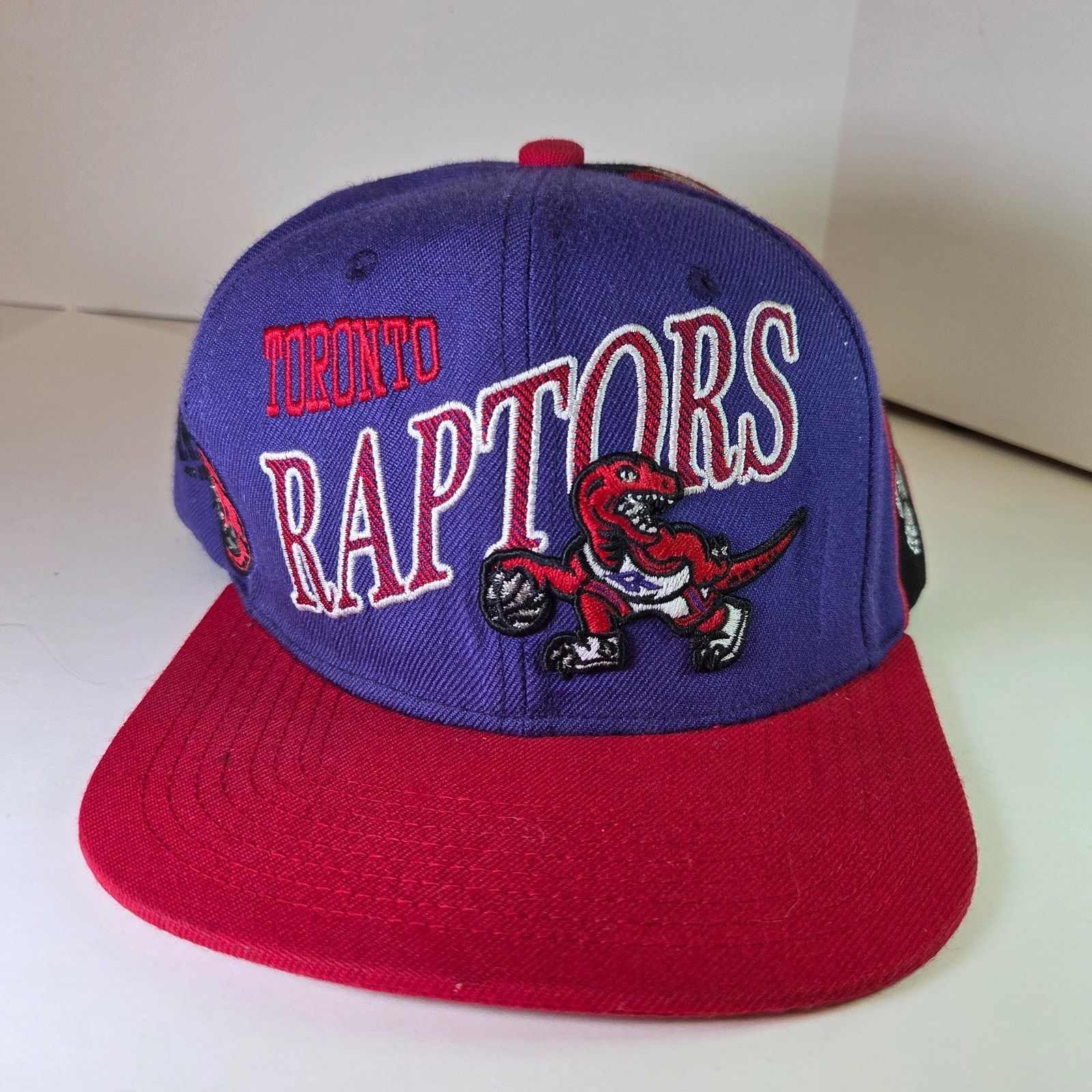 Mitchell & Ness Toronto Raptors Mitchell & Ness Snapback Hat Purple Red Size ONE SIZE - 1 Thumbnail