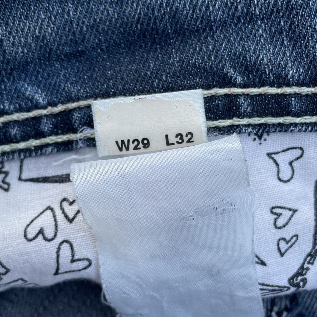 VINTAGE Y2K EVISU X PUMA DISTRESSED WASHED DENIM PANTS
