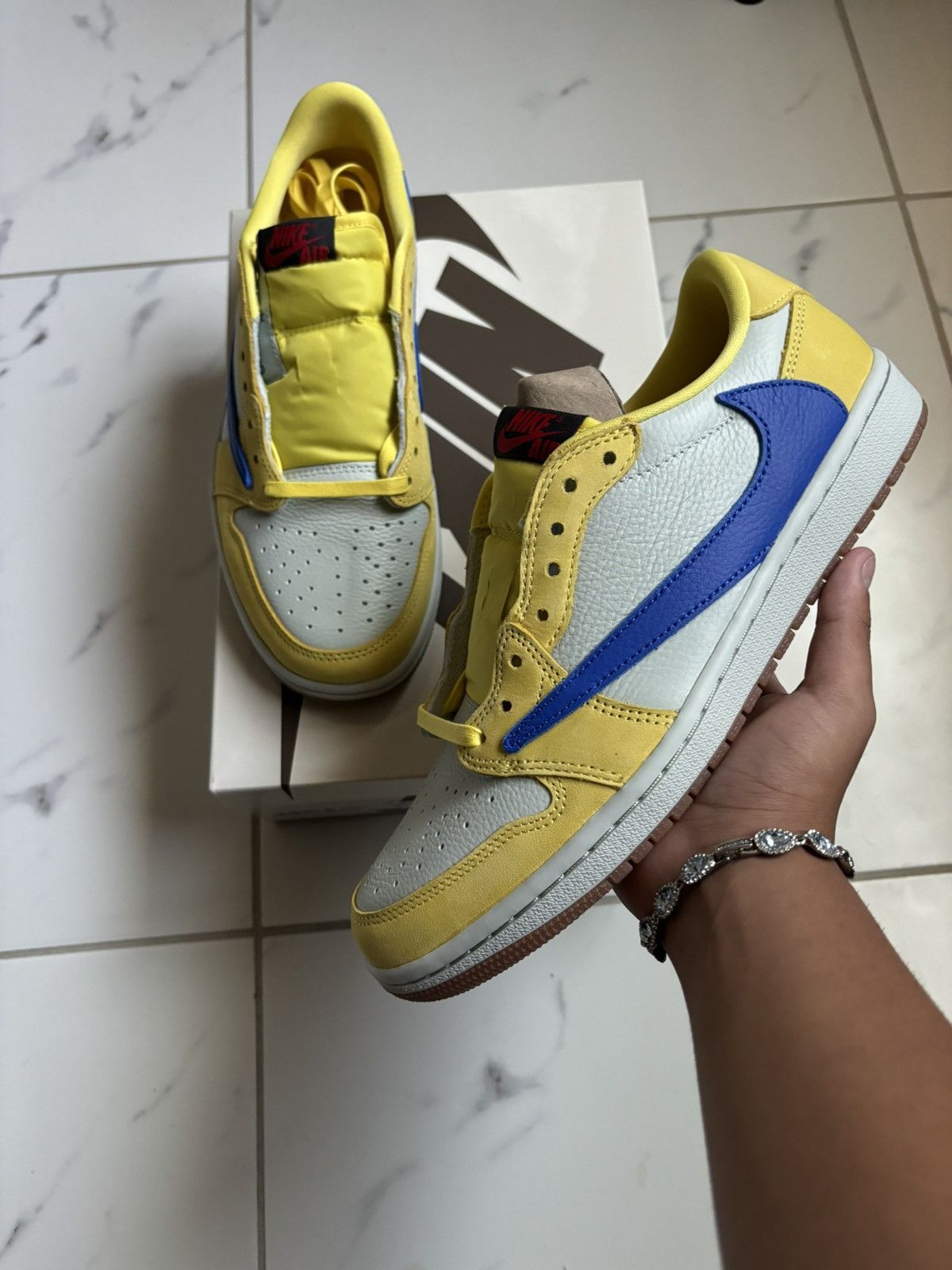 Travis Scott Jordan 1s low Travis Scott “Canary” | Grailed