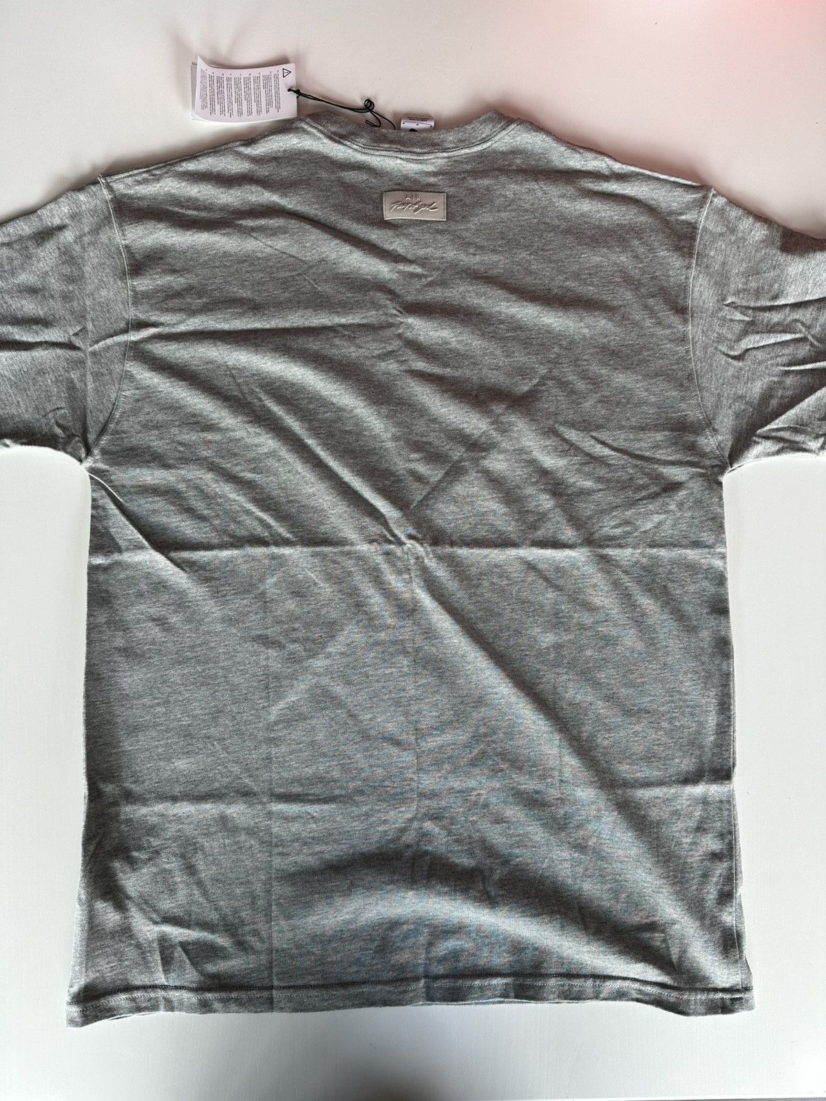 Fear of God × Nike Fear Of God x Nike NBA Warm Up T-Shirt Dark Heather Grey Size US M / EU 48-50 / 2 - 3 Thumbnail