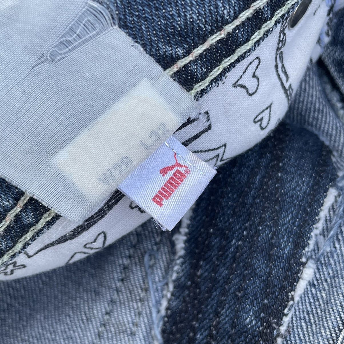 VINTAGE Y2K EVISU X PUMA DISTRESSED WASHED DENIM PANTS