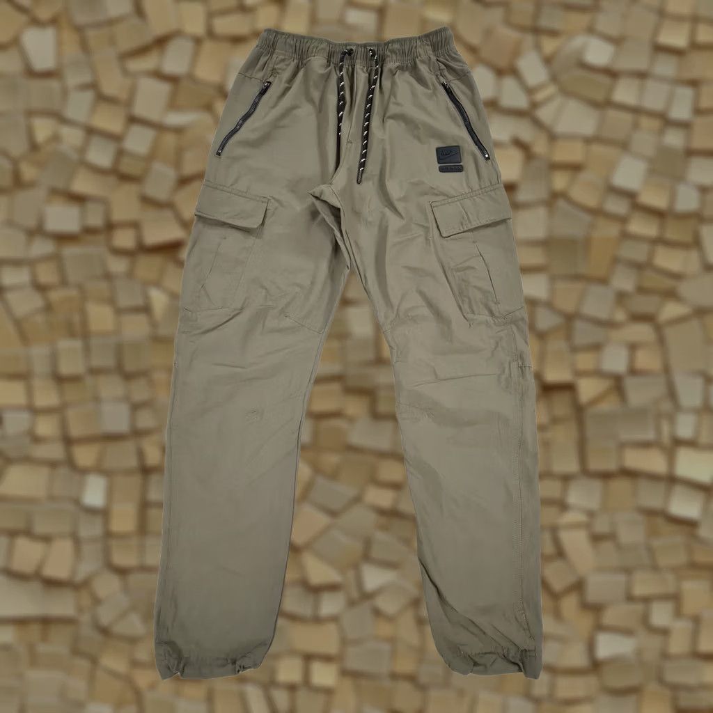 Nike Nike Air Max Cargo Pants Mens Small Green Woven Joggers BV4923 325 Elastic Waist Pockets Zip Pocket Exercise Athletic Shirt? Size US 29 - 1 Thumbnail