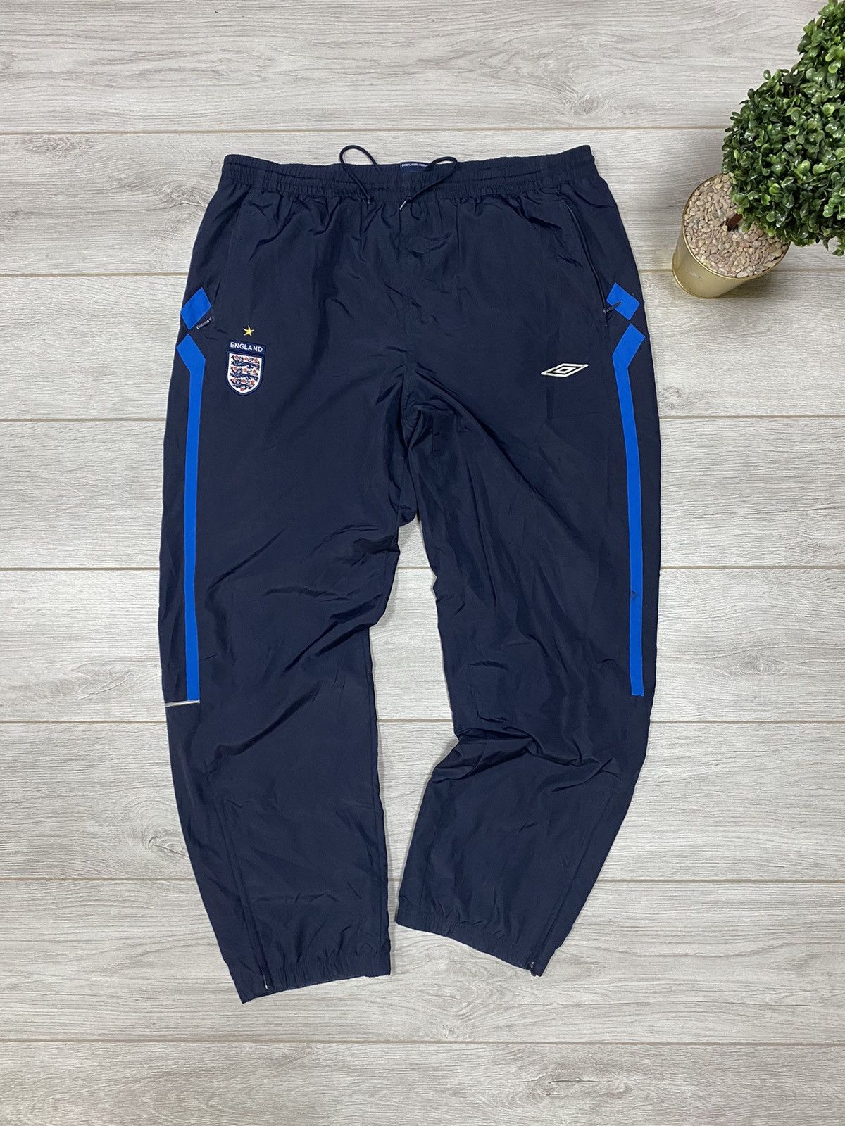 Vintage Umbro England vintage nylon pants drill | Grailed
