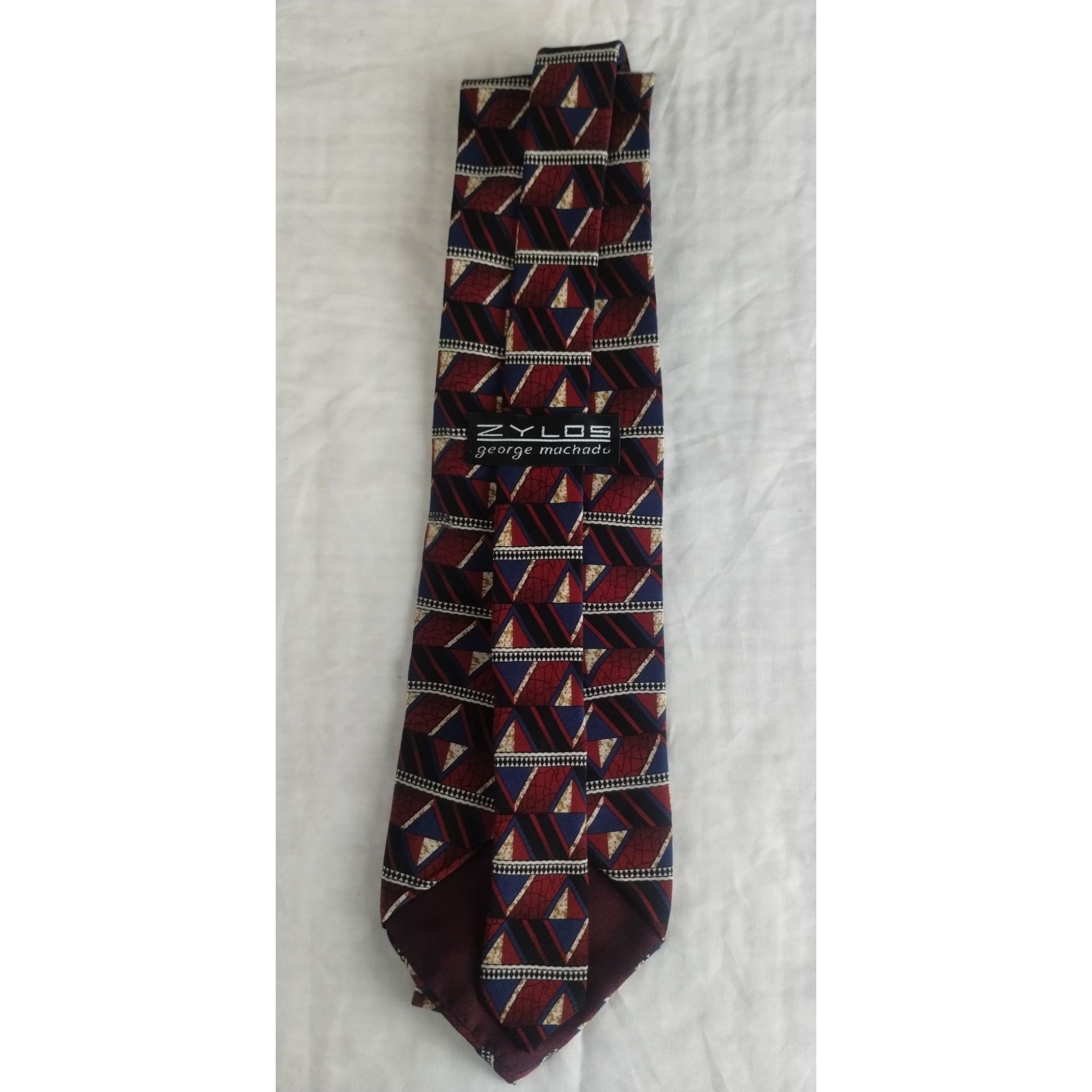 zylos george machado tie