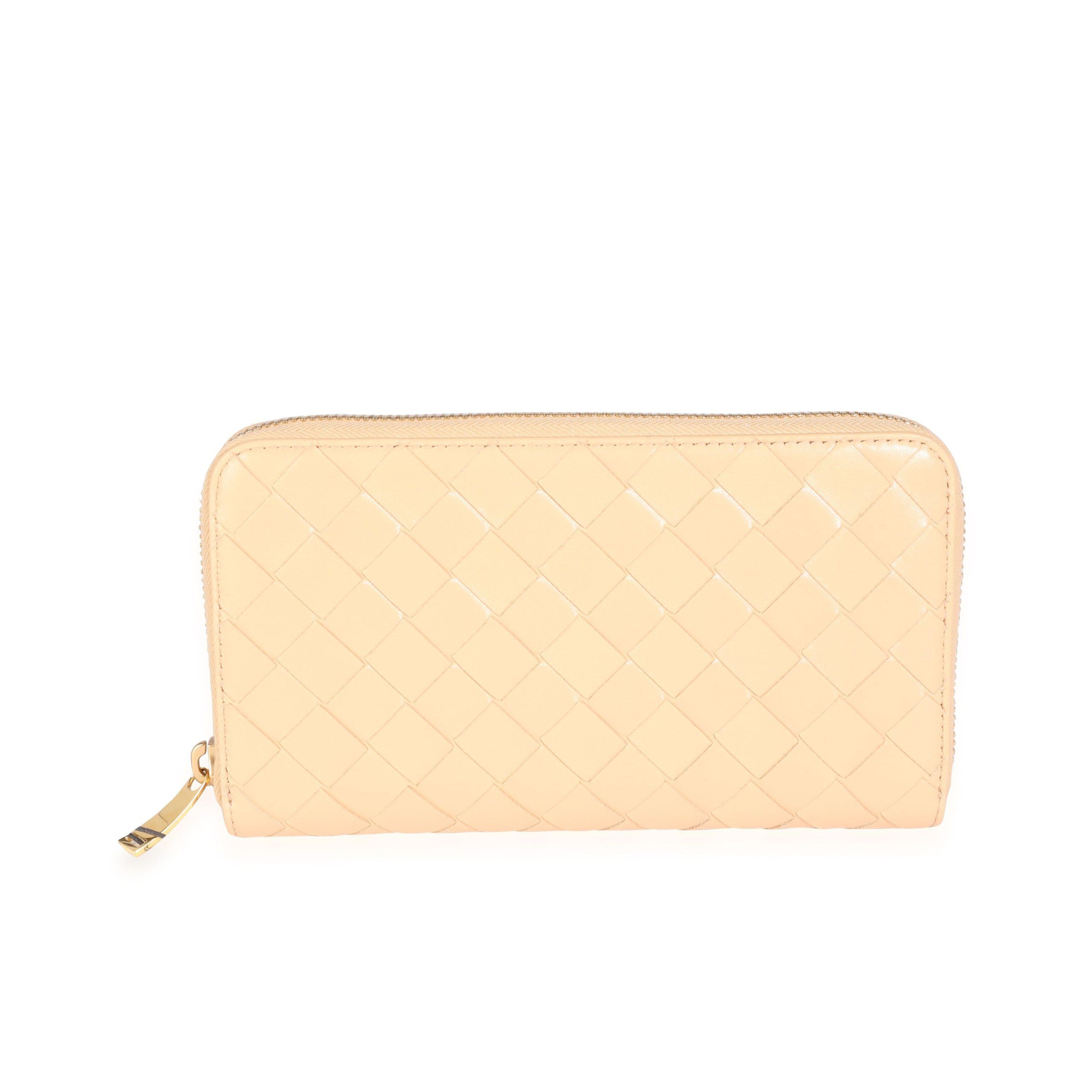 image of Bottega Veneta Almond Intrecciato Woven Lambskin Zip Around Wallet in Beige, Women's