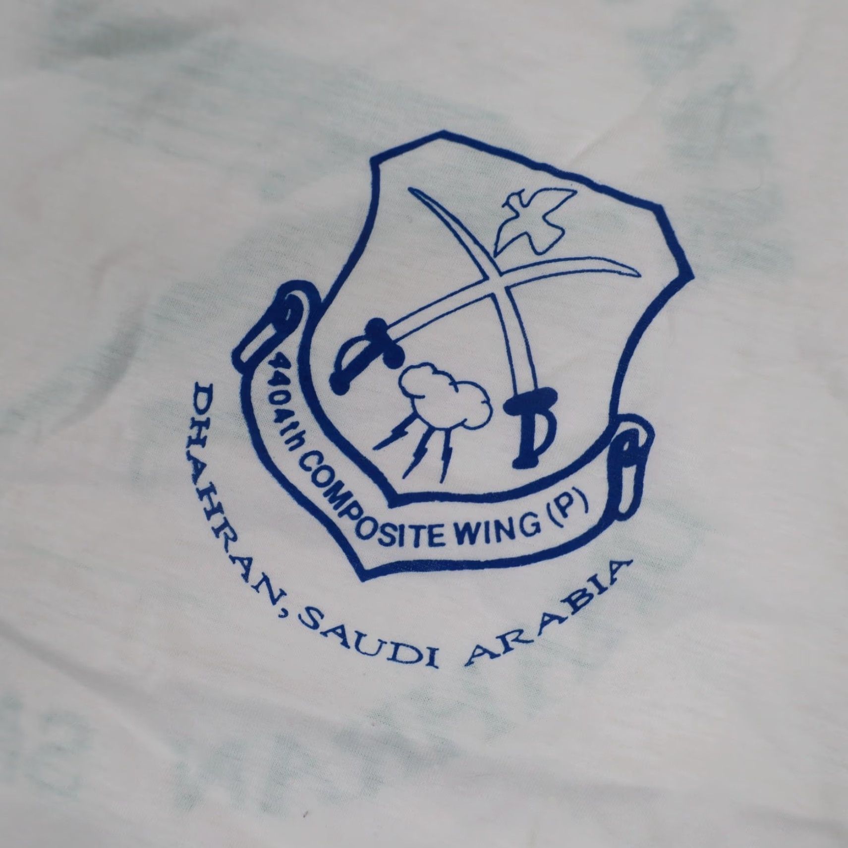 Vintage VINTAGE 90s 4404th Composite Wing (P) Saudi Arabia 100 Mile Club T Shirt Large Mens White XXL 100 Mile Club 90s Vintage Shirt Size US L / EU 52-54 / 3 - 5 Thumbnail