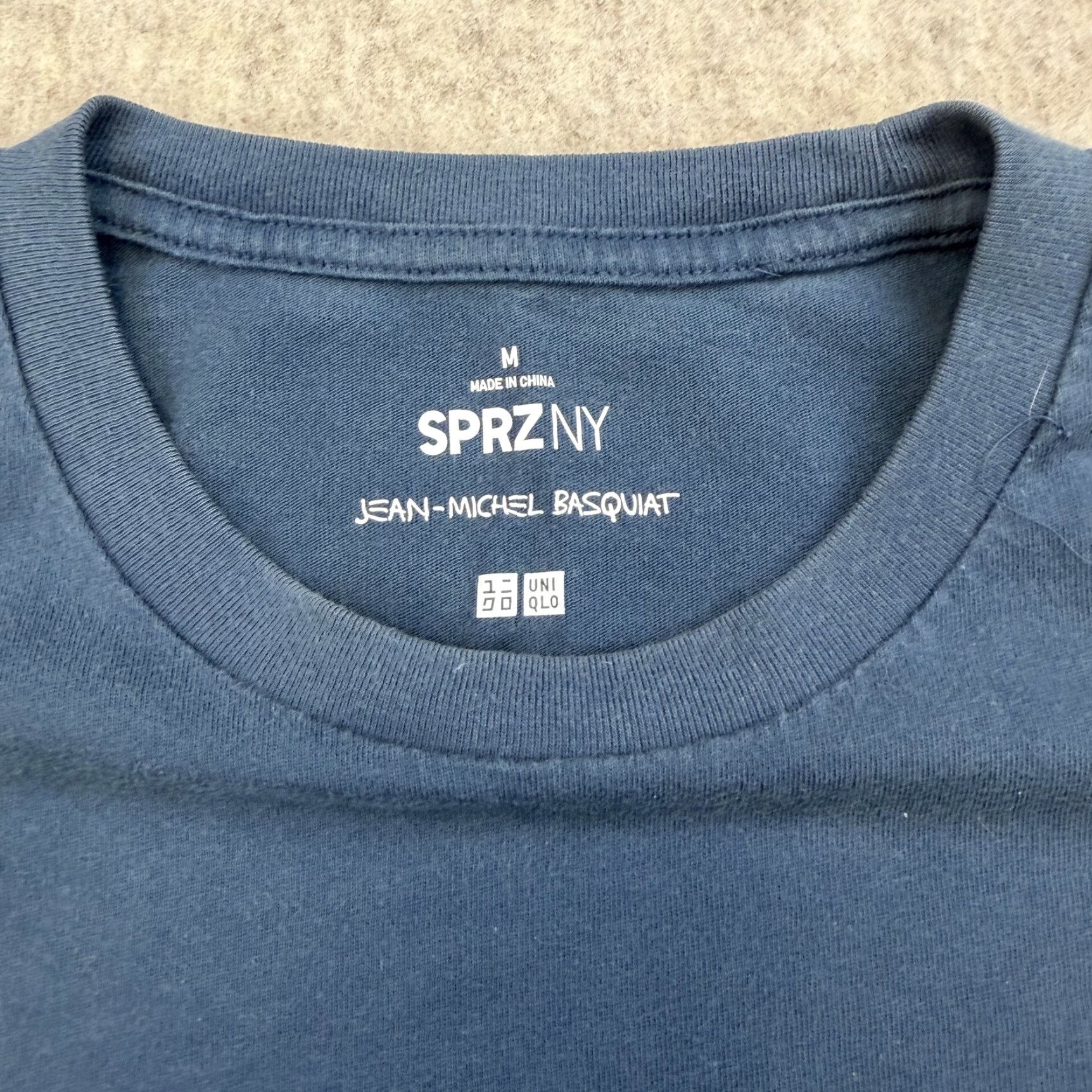 Uniqlo Uniqlo SPRZ NY Jean-Michel Basquiat Graphic Pocket Tee Shirt Mens M Blue Graphic Print Streetwear Pop Culture Size US 31 - 6 Thumbnail