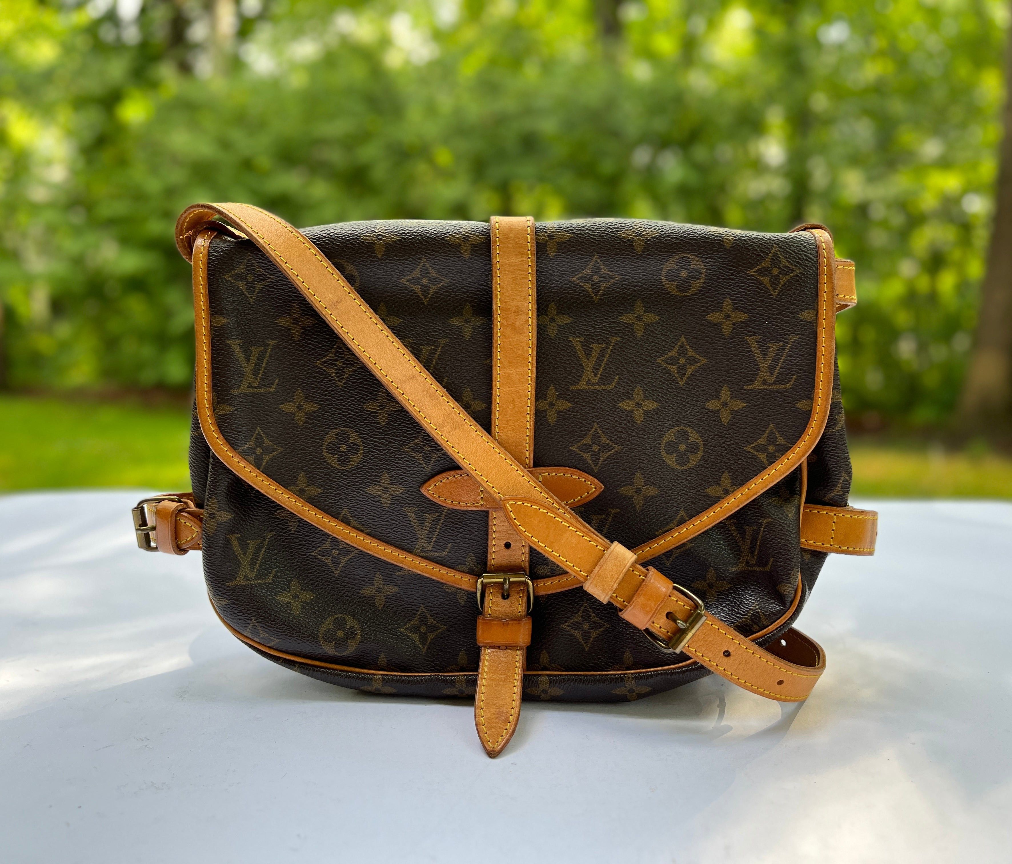 Sold at Auction: LOUIS VUITTON - SAUMUR 30 CROSSBODY FLAP BAG - LV MONOGRAM  - MEDIUM