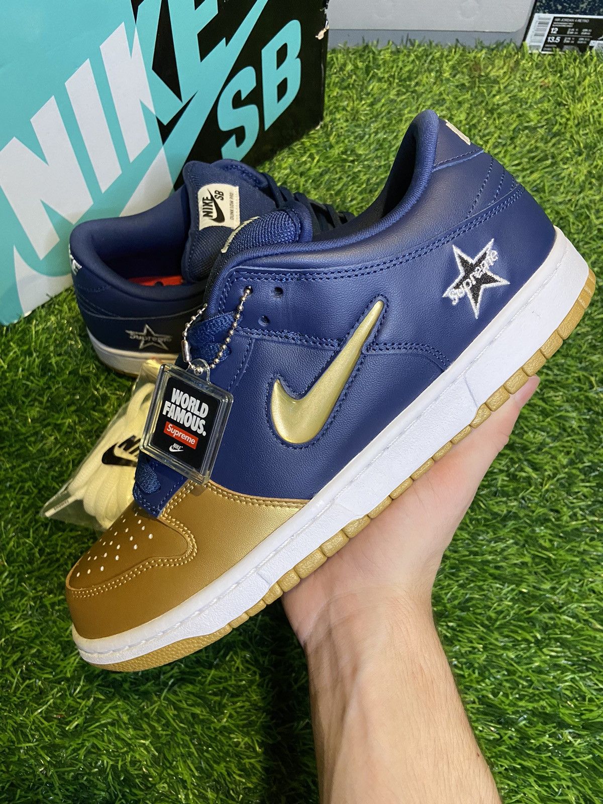 Supreme Supreme x Nike dunk sb low 'Metallic Gold' | Grailed