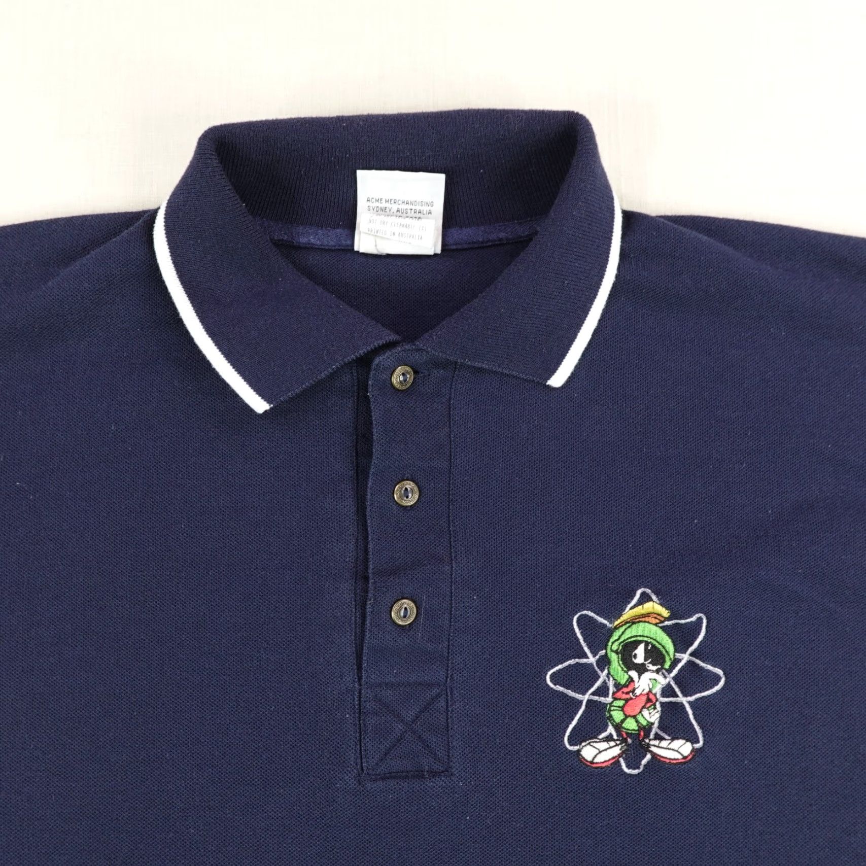 Vintage VINTAGE Looney Tunes ACME Polo Shirt Mens M Blue 90s Cartoon Marvin Martian Polo Short Sleeve Button Logo Cotton Polyester Knit Regular Man Size US M / EU 48-50 / 2 - 2 Thumbnail
