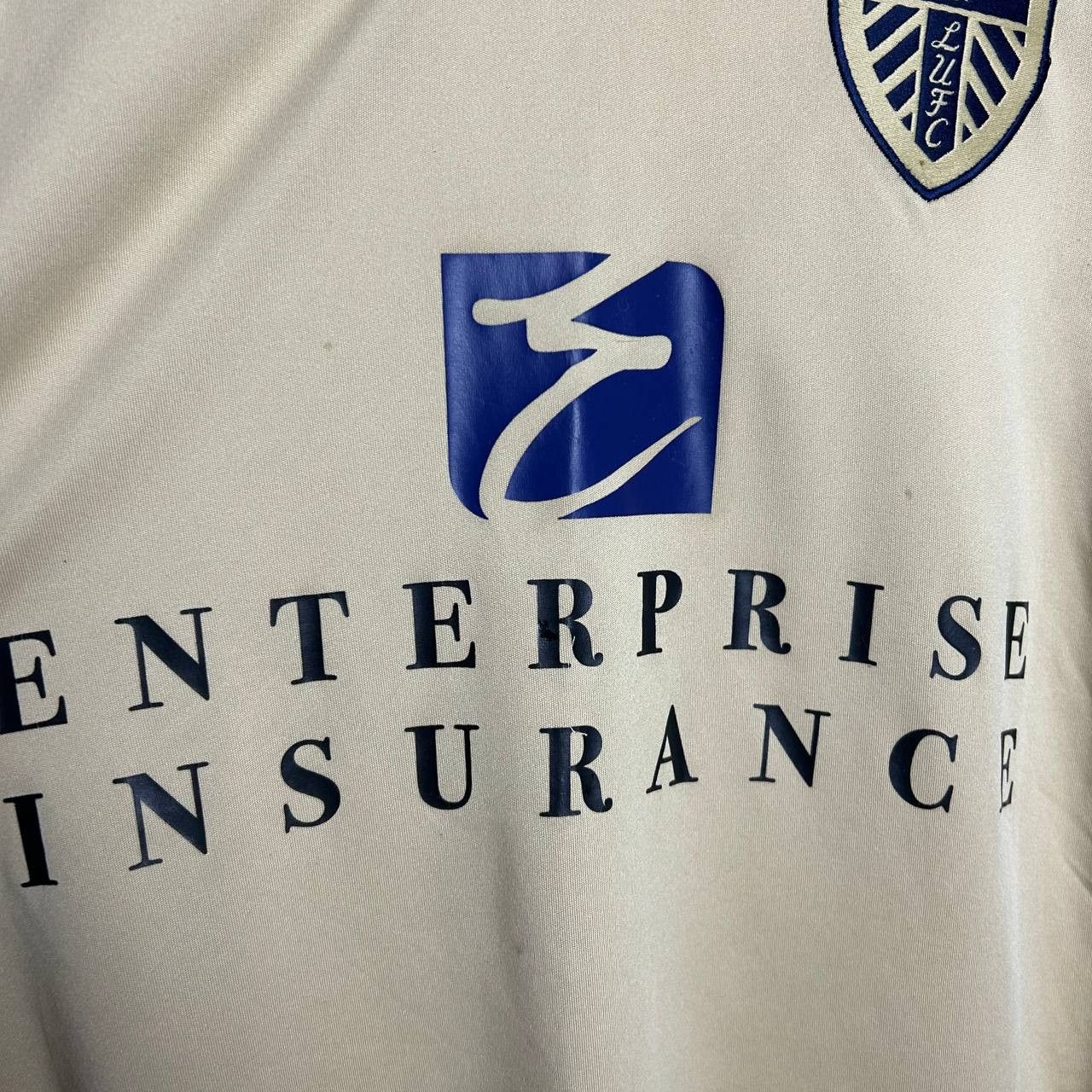 Macron Vintage Macron FC Leedc United home 2000s soccer jersey Size US L / EU 52-54 / 3 - 4 Thumbnail