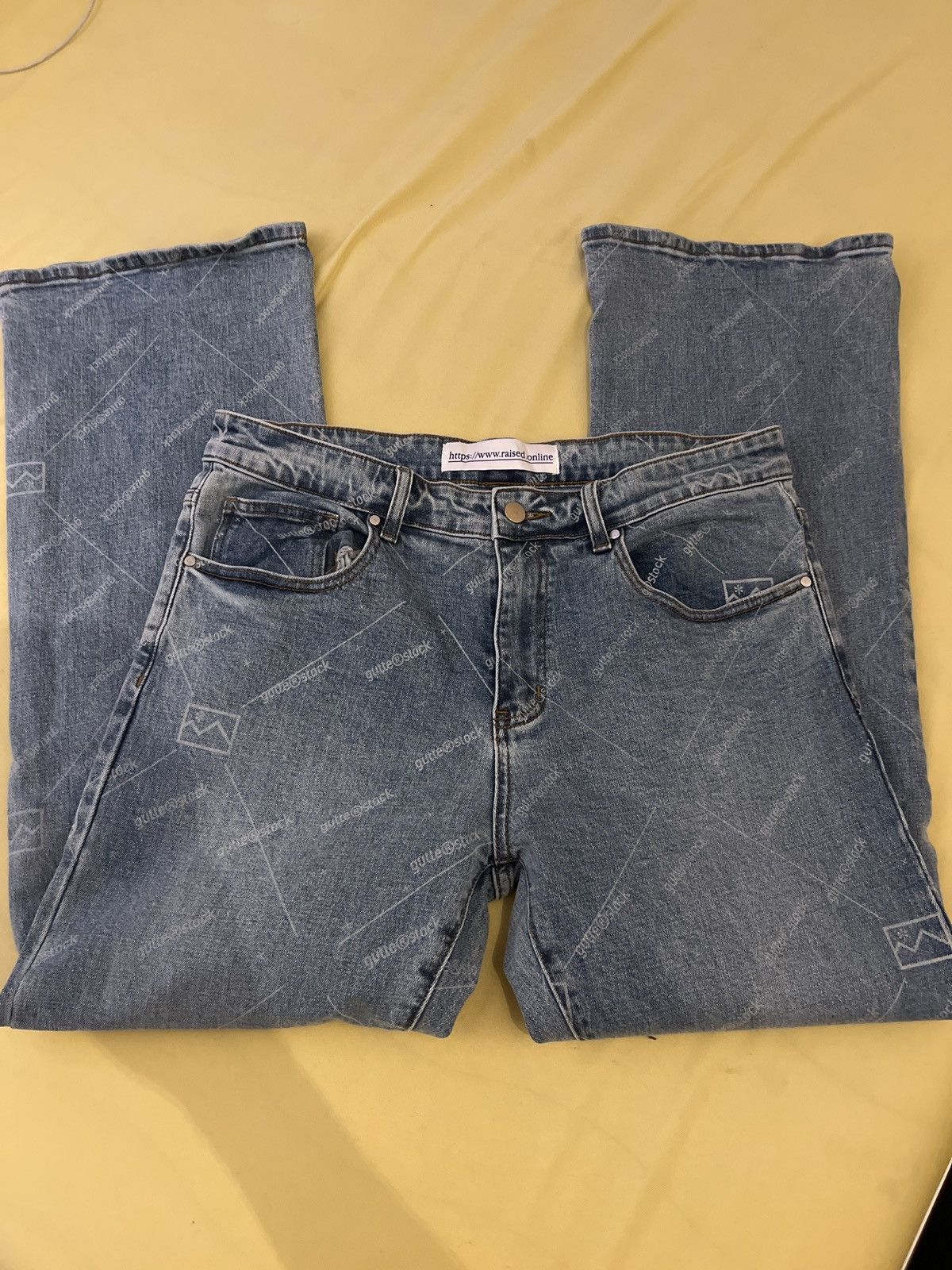 Raised online watermark flared jeans