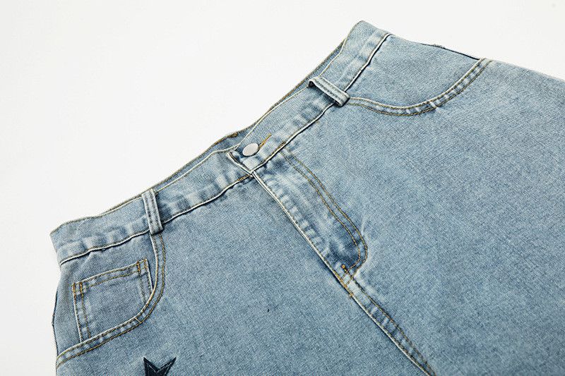 Vintage star embroidered distressed washed curved jeans